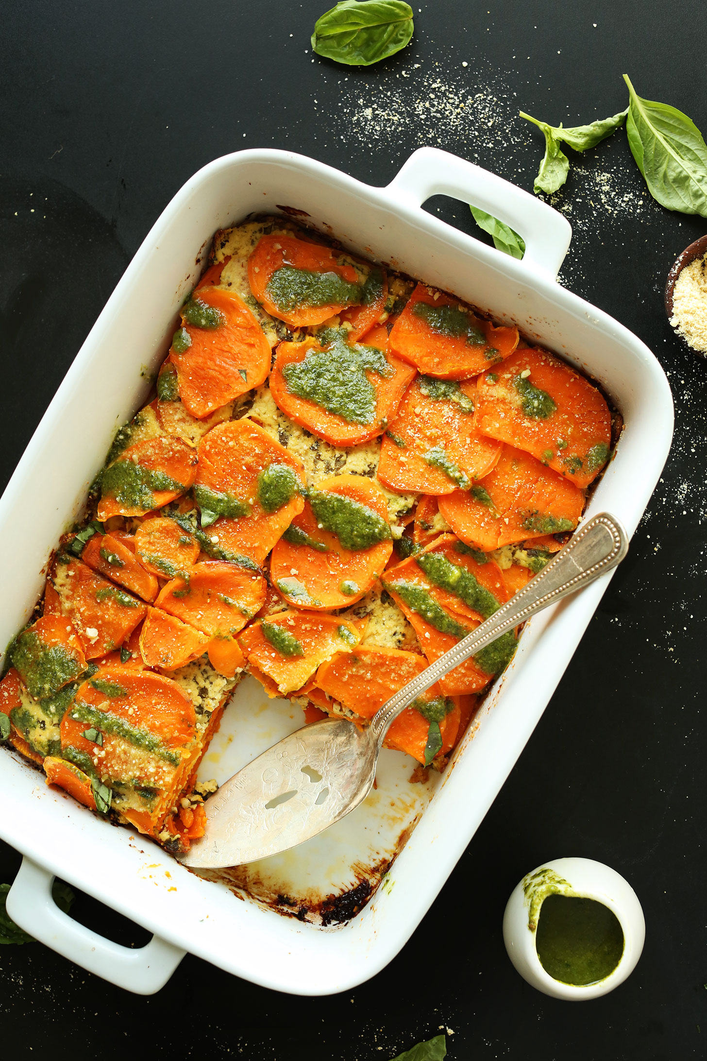 Baking pan of Vegan Sweet Potato Lasagna with a serving removed