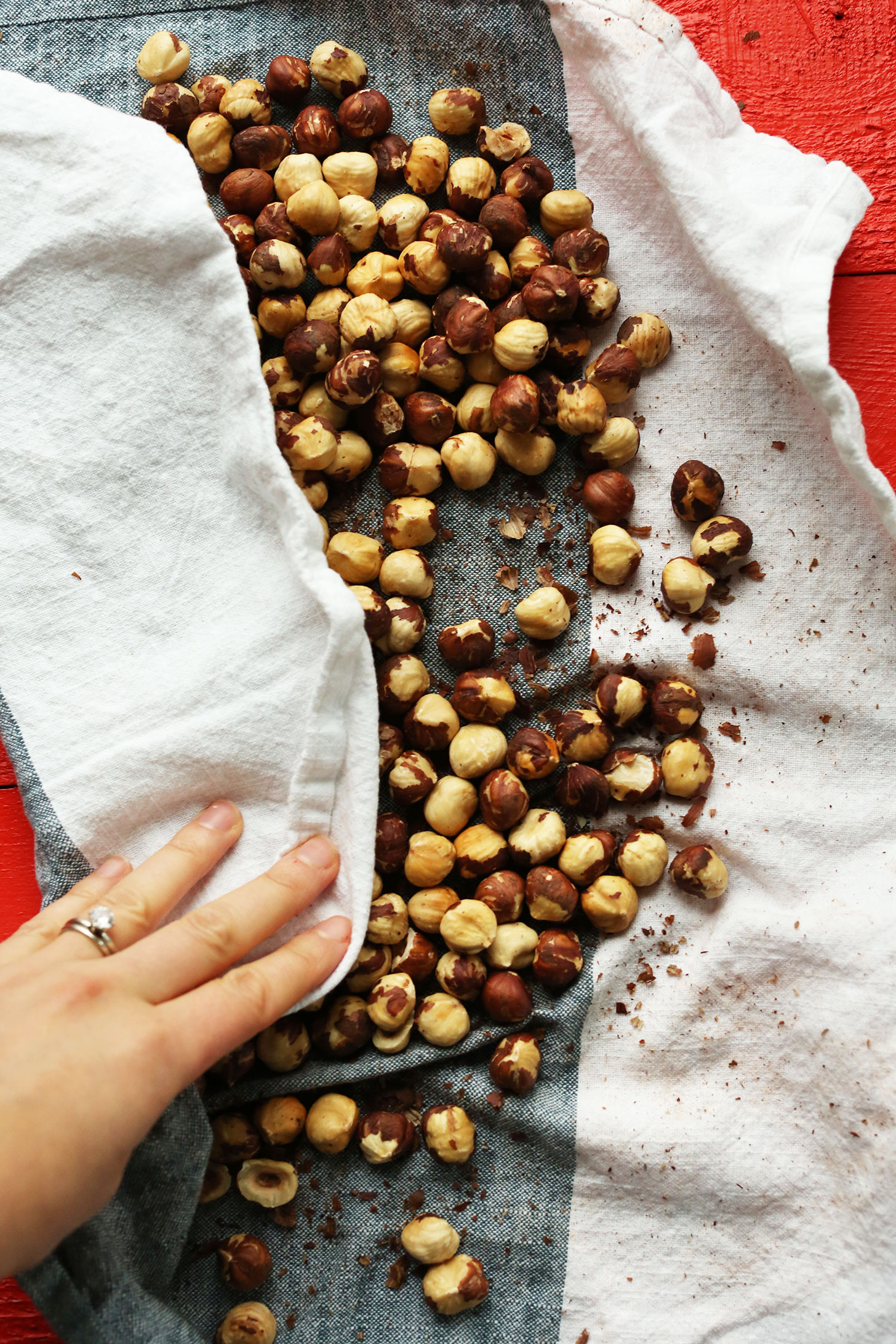 Using a towel to get the skins off of roasted hazelnuts