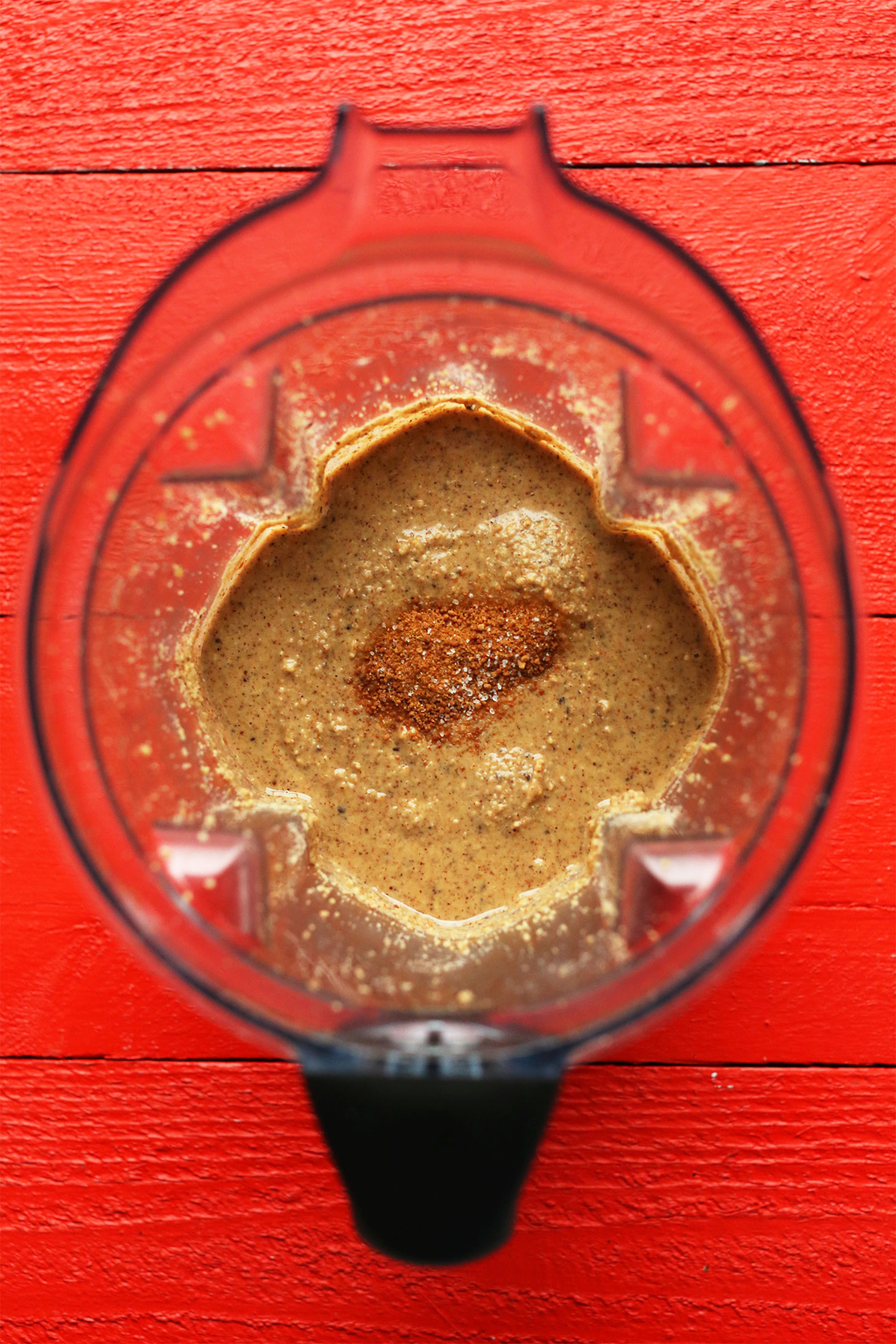 Blender with ingredients for homemade Cinnamon Hazelnut Butter
