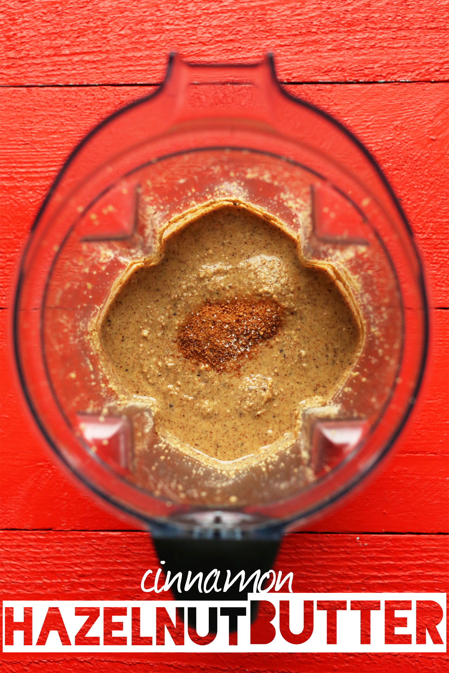 Blender with ingredients for making homemade Cinnamon Hazelnut Butter