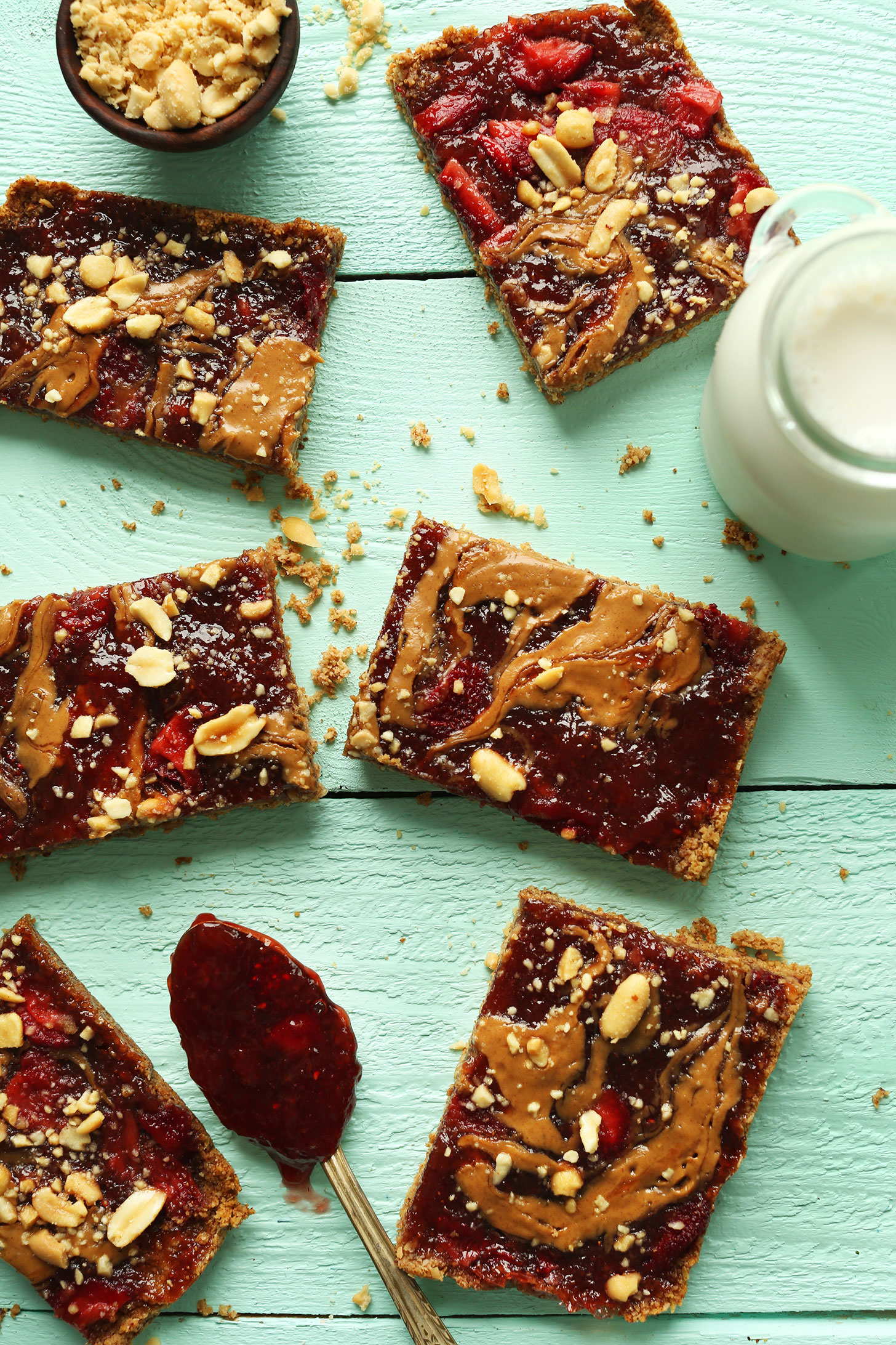 Squares of our easy gluten-free vegan PB&J Oat Bars