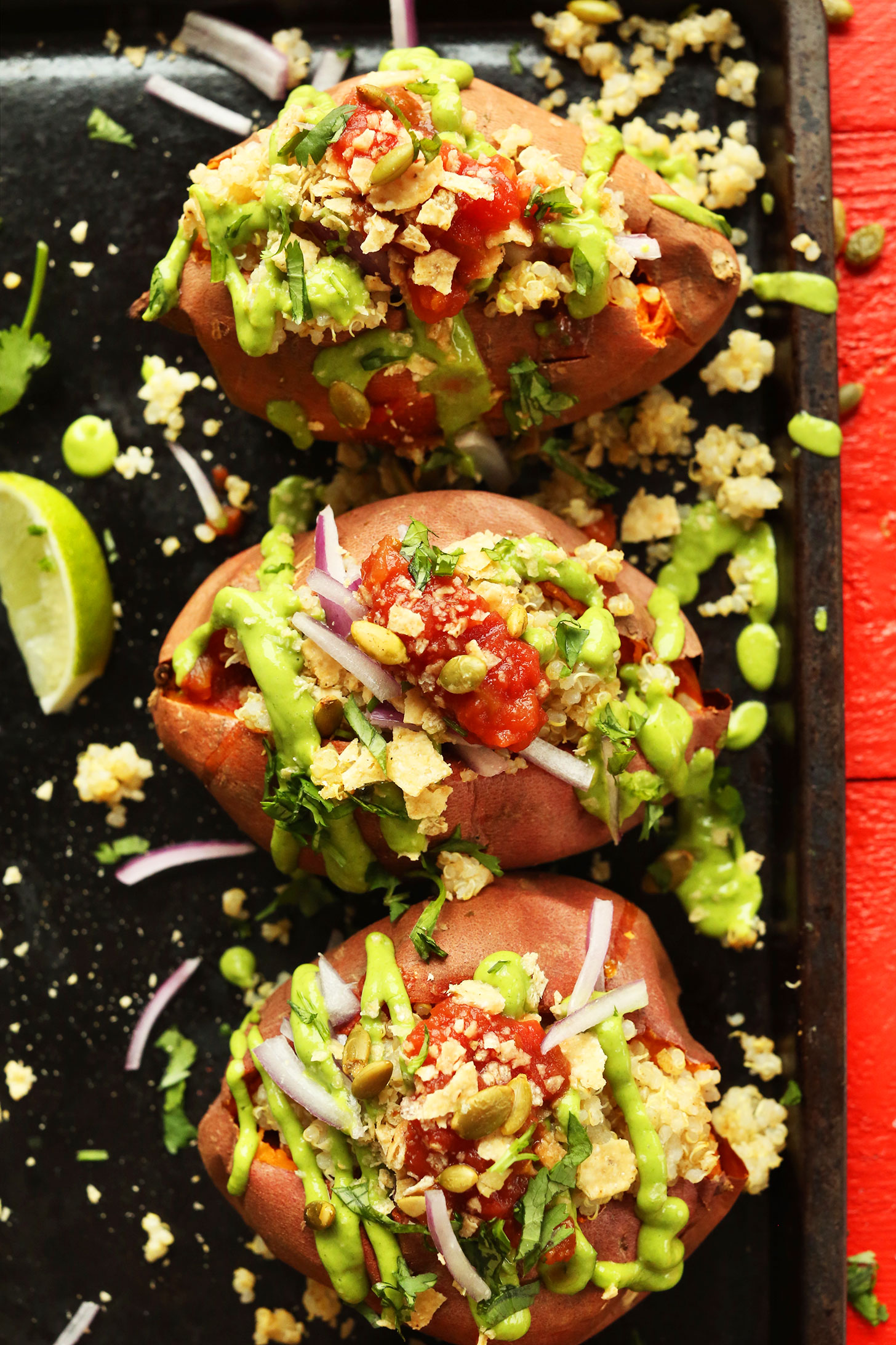 Tray of our healthy Quinoa Stuffed Sweet Potatoes recipe for a gluten-free vegan dinner