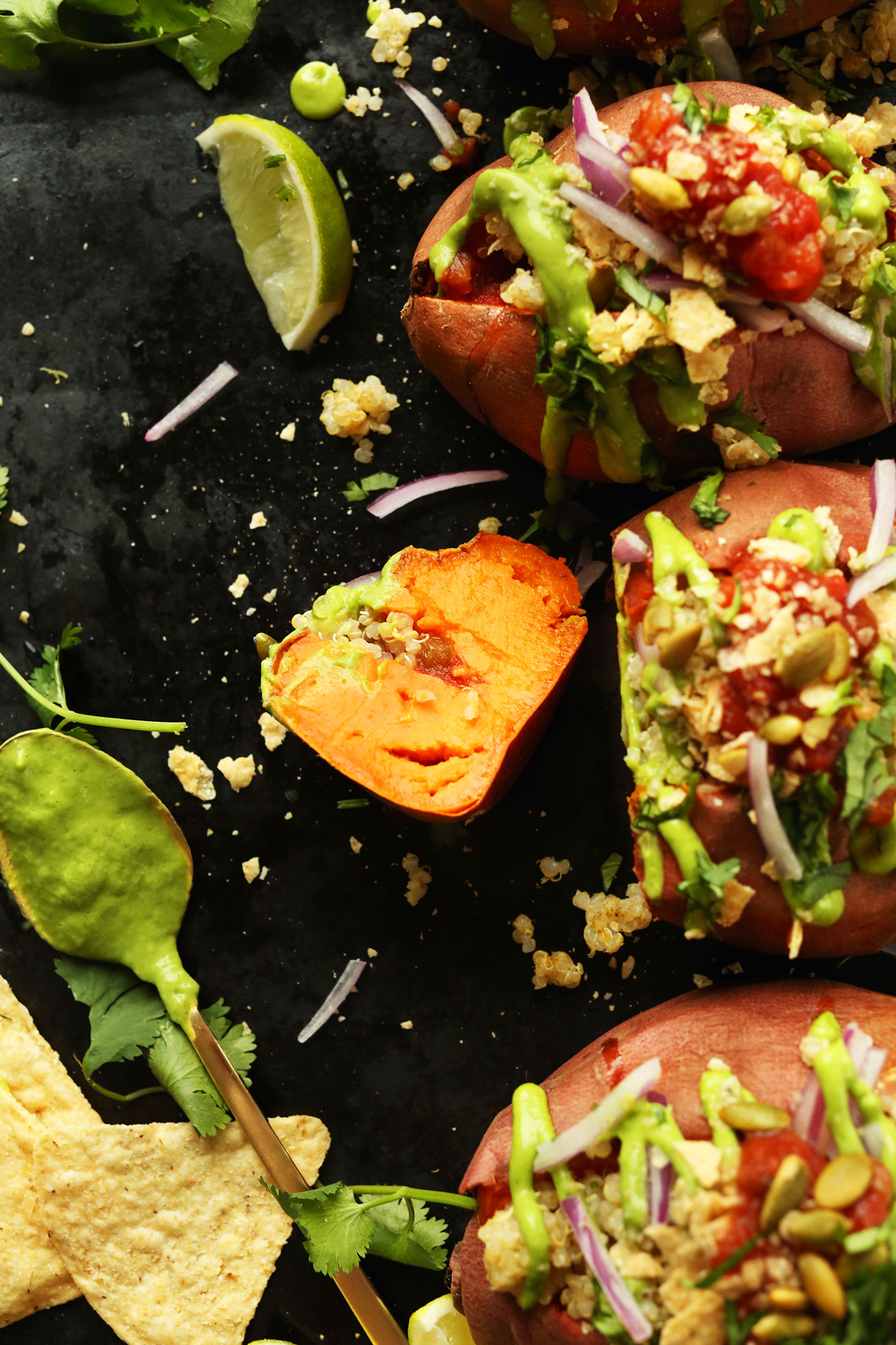 Quinoa Stuffed Sweet Potatoes on a tray ready to be devoured for a healthy plant-based meal