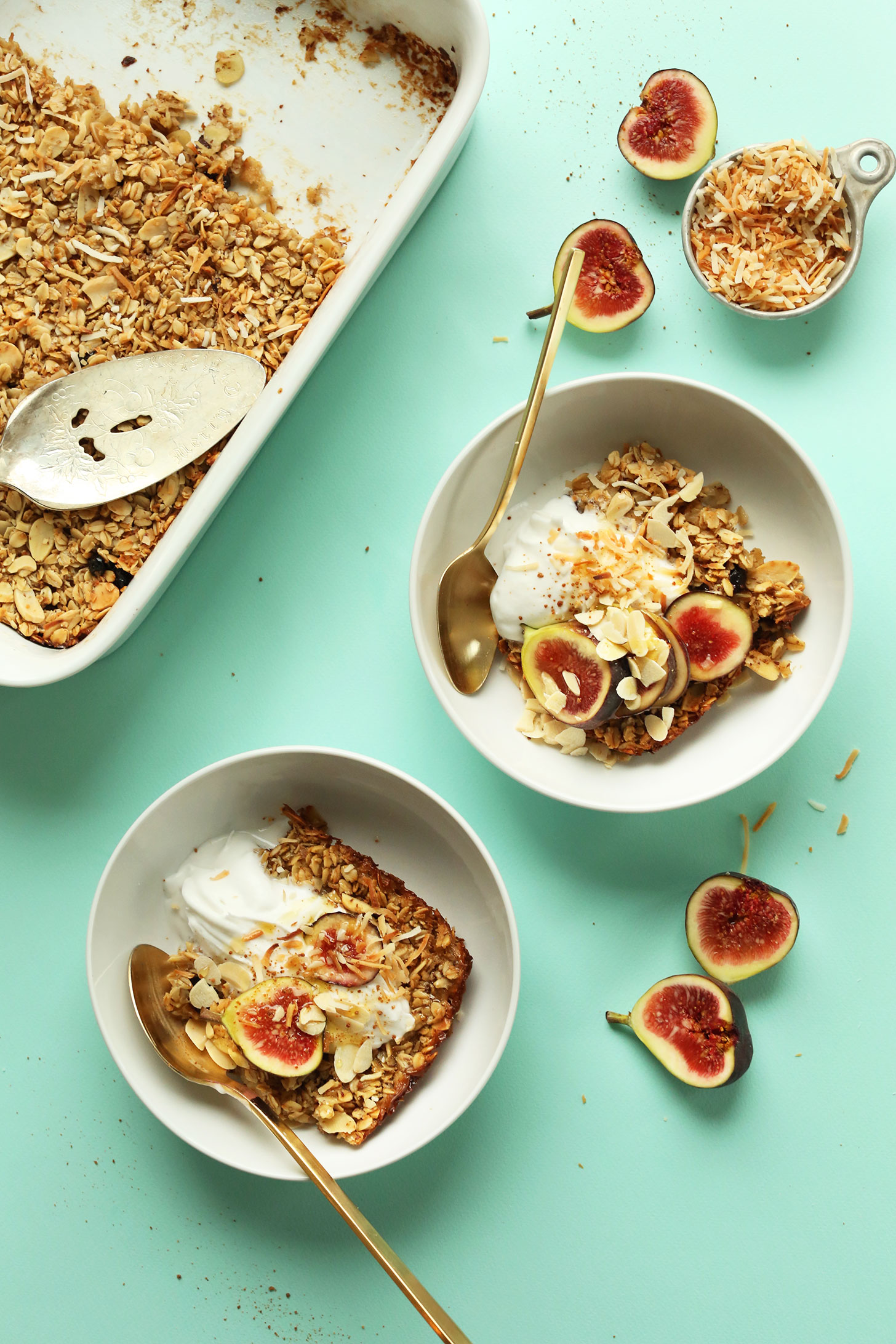 Serving bowls with Toasted Coconut Baked Oatmeal topped with fresh figs