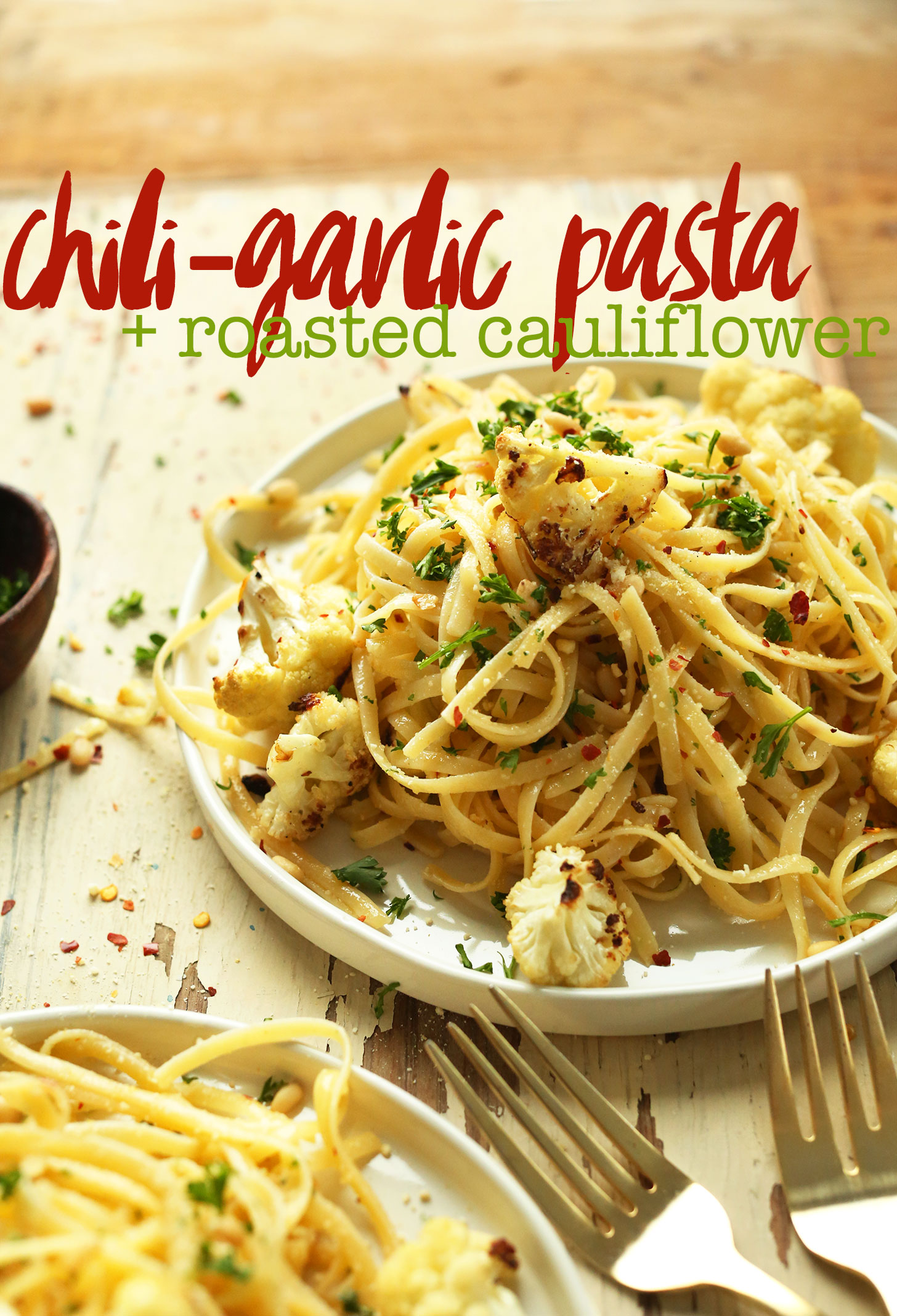 Plate of our vegan Garlic Chili Pasta with Roasted Cauliflower for a flavorful vegan dinner