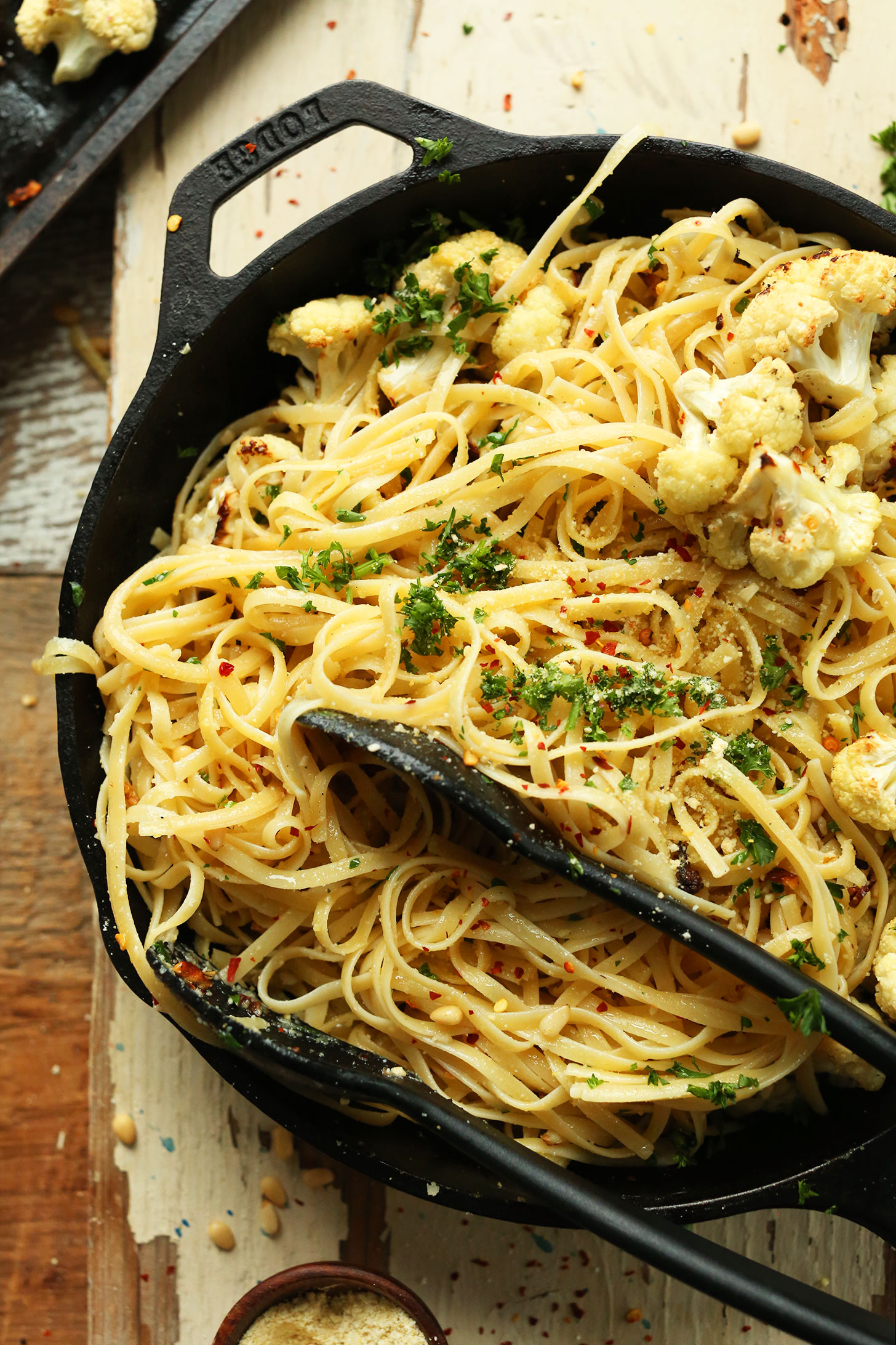 Cast-iron skillet filled with Garlicky Spicy Pasta with Roasted Cauliflower