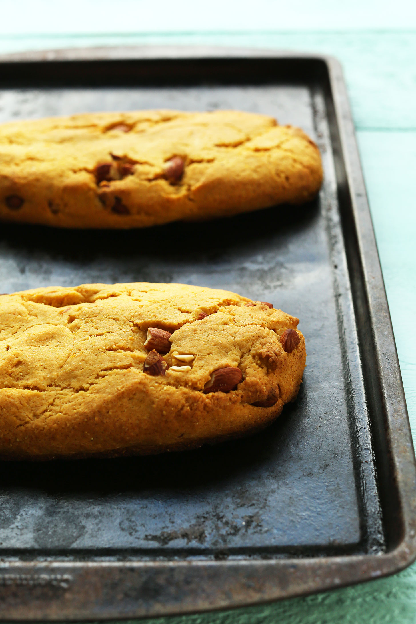 Baking sheet with freshly baked Vegan Biscotti ready for slicing