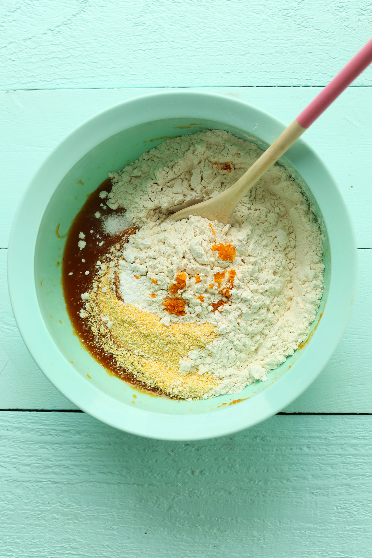 Mixing wet and dry ingredients together for our Easy Vegan Biscotti recipe