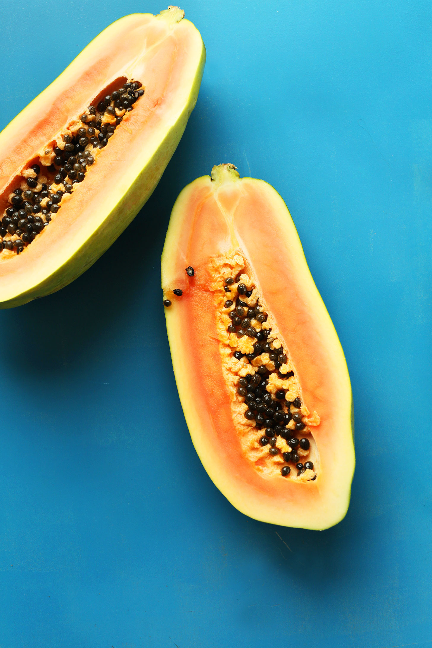 Halved papaya for making into a delicious vegan smoothie