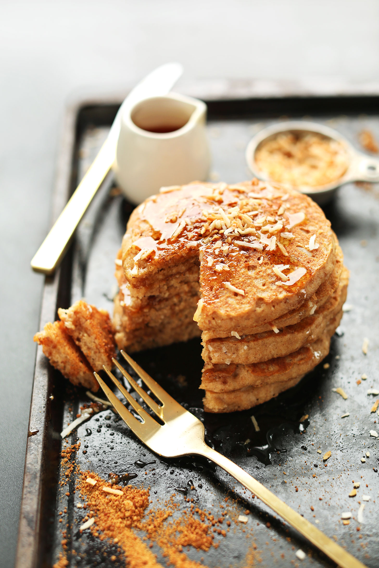 Stack of homemade Toasted Vegan Coconut Pancakes for a delicious breakfast