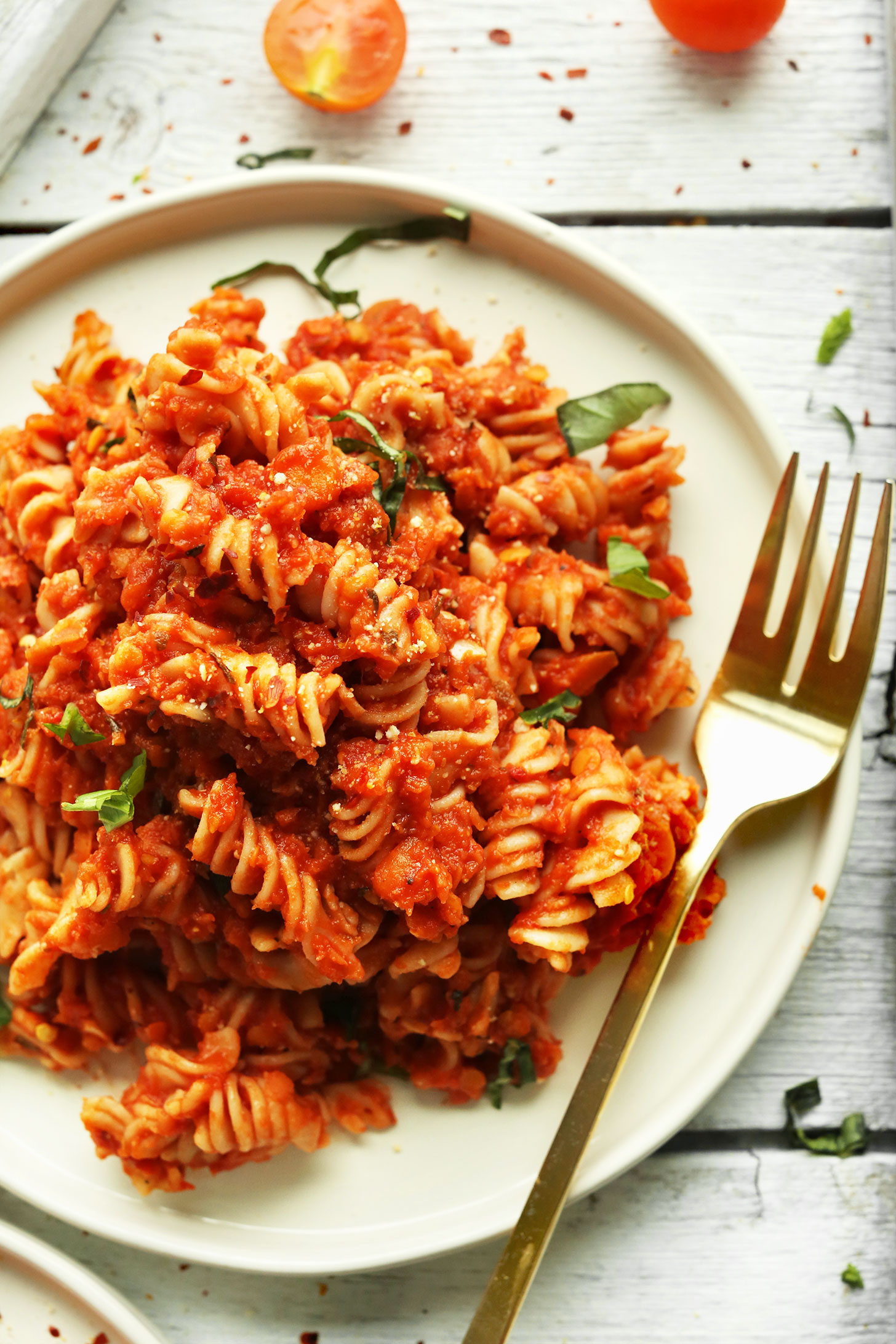 Plate filled with our Spicy Red Pasta with Lentils for a healthy gluten-free vegan meal
