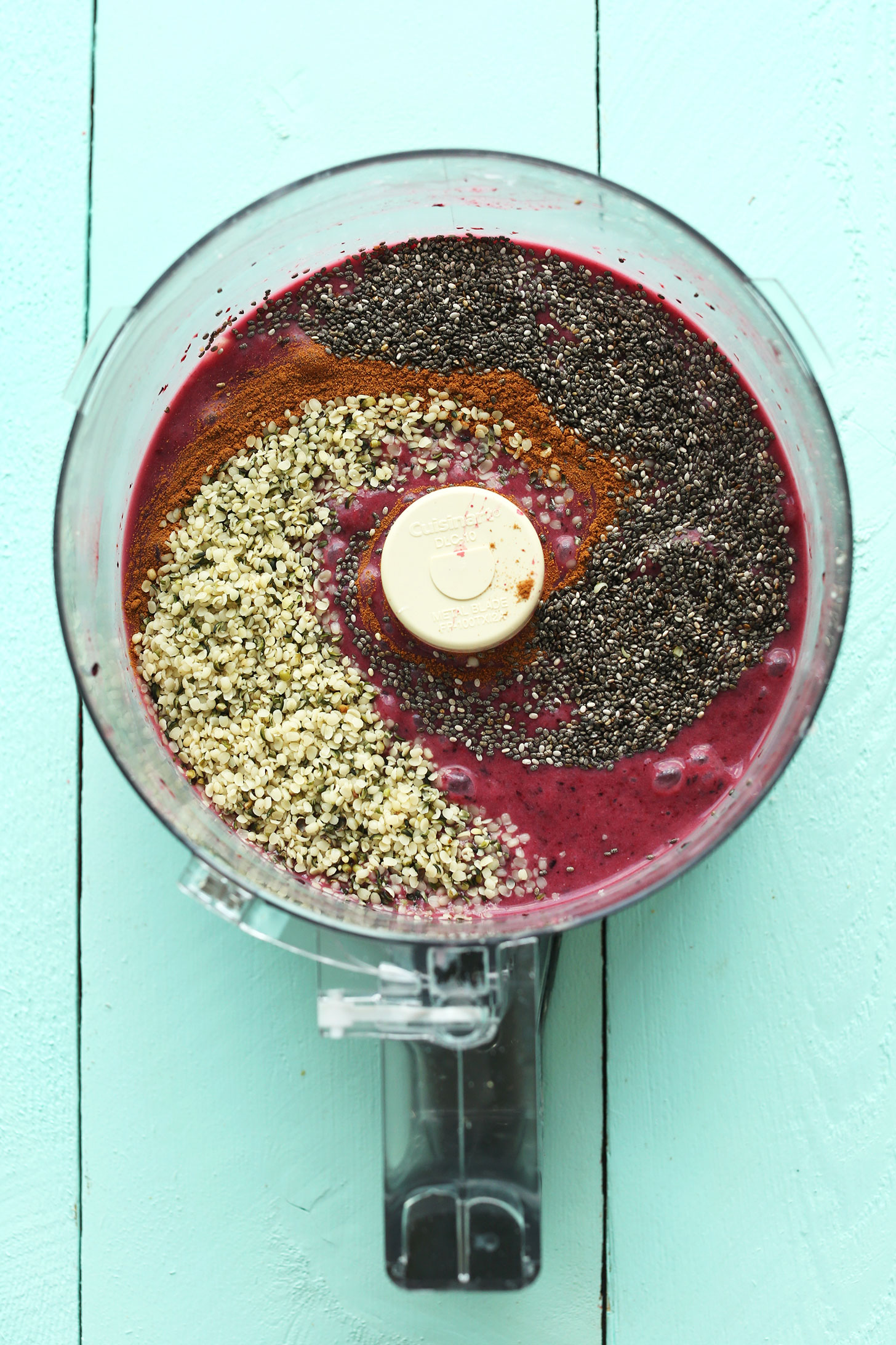 Food processor filled with our freshly blended Banana and Hempseed Berry Pudding recipe