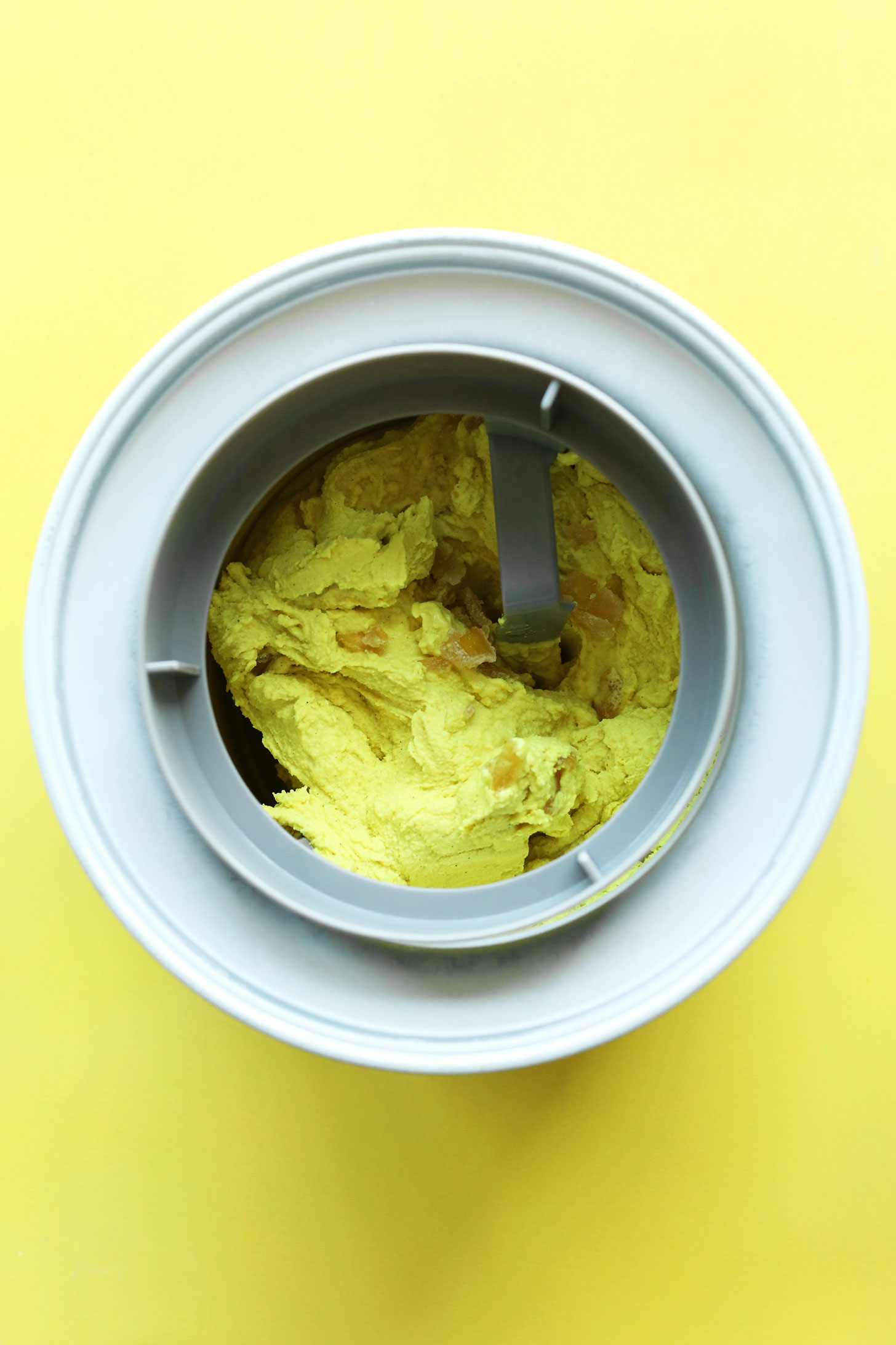 Vegan Golden Milk Ice Cream churning in an ice cream maker