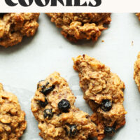 Freshly baked blueberry muffin breakfast cookies on a baking sheet