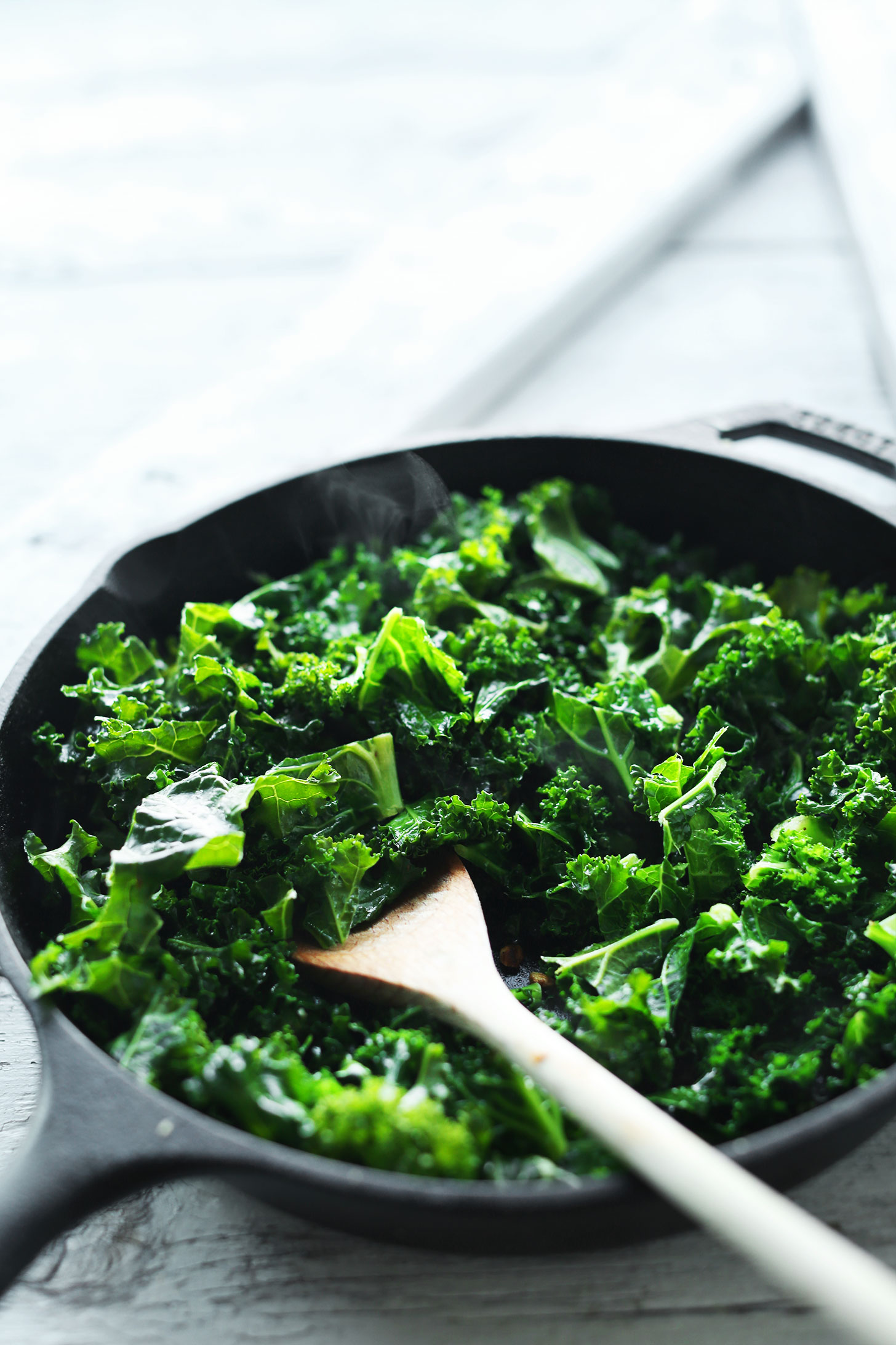 Sautéing kale for our Creamy Kale & White Bean Artichoke Dip recipe