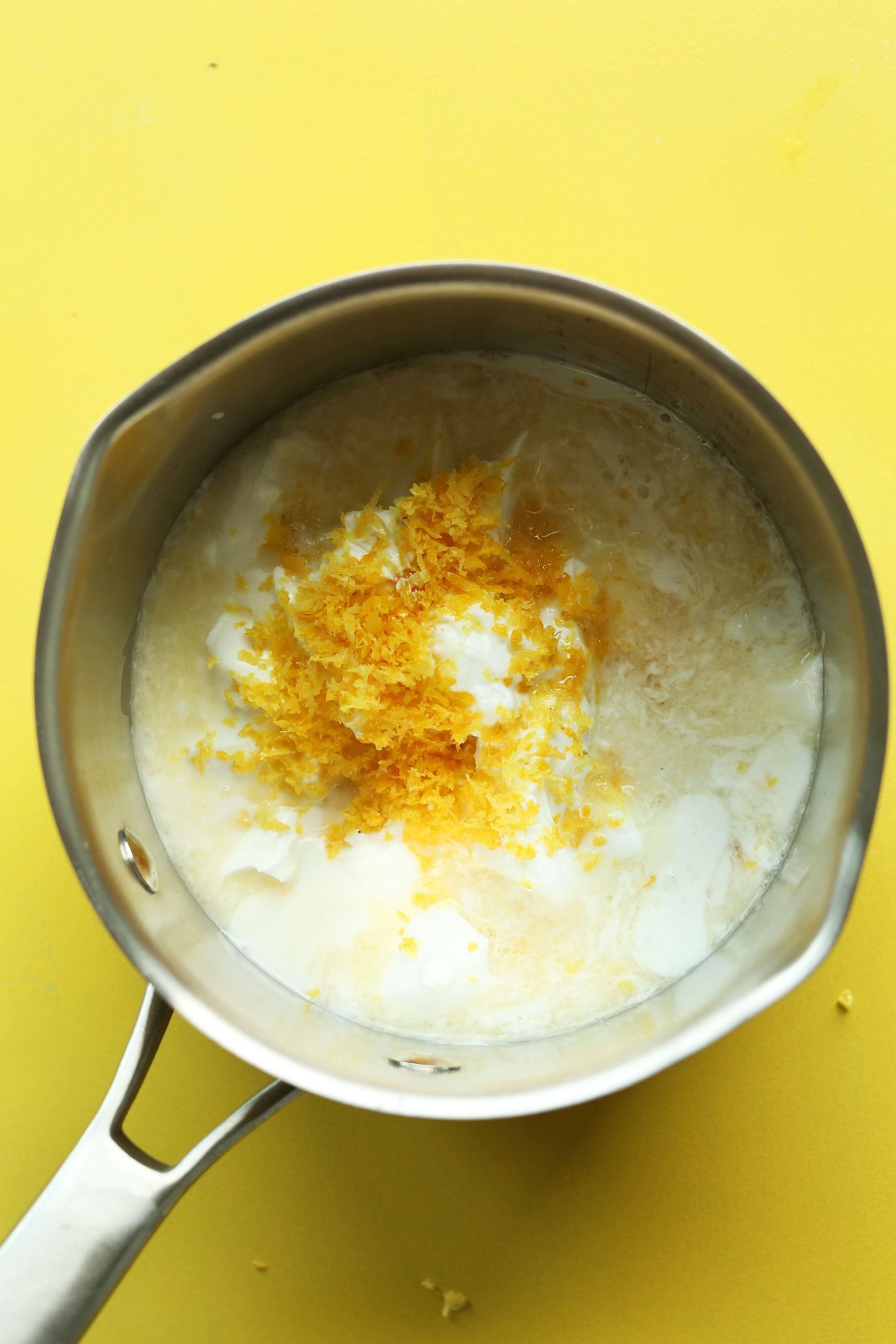 Cooking our vegan lemon curd recipe in a saucepan