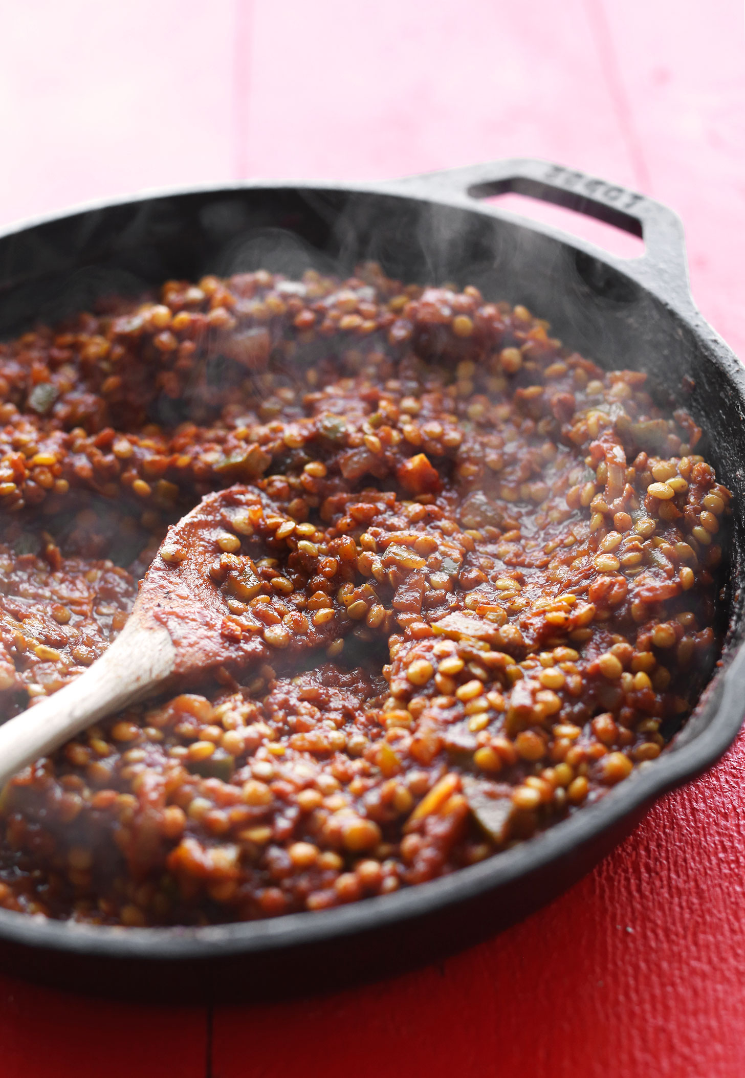 Cast-iron skillet filled with Vegan Sloppy Joe "meat" for a hearty plant-based meal