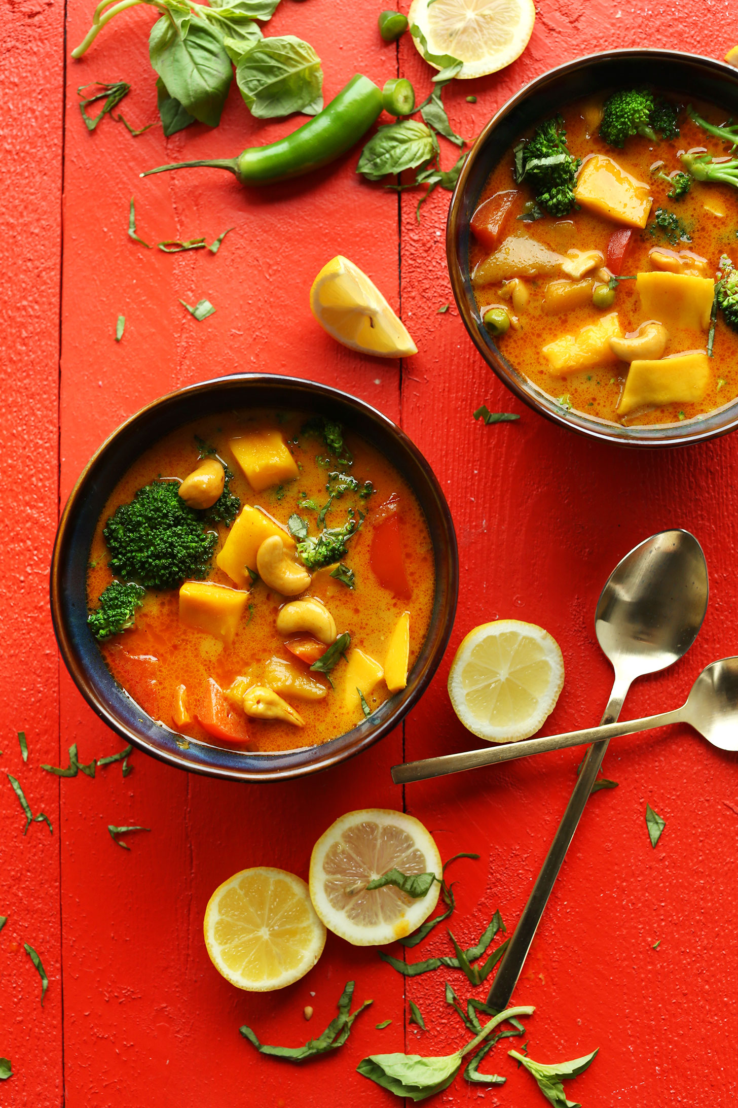 Two bowls of our Yellow Thai Mango Curry recipe for an easy gluten-free vegan dinner
