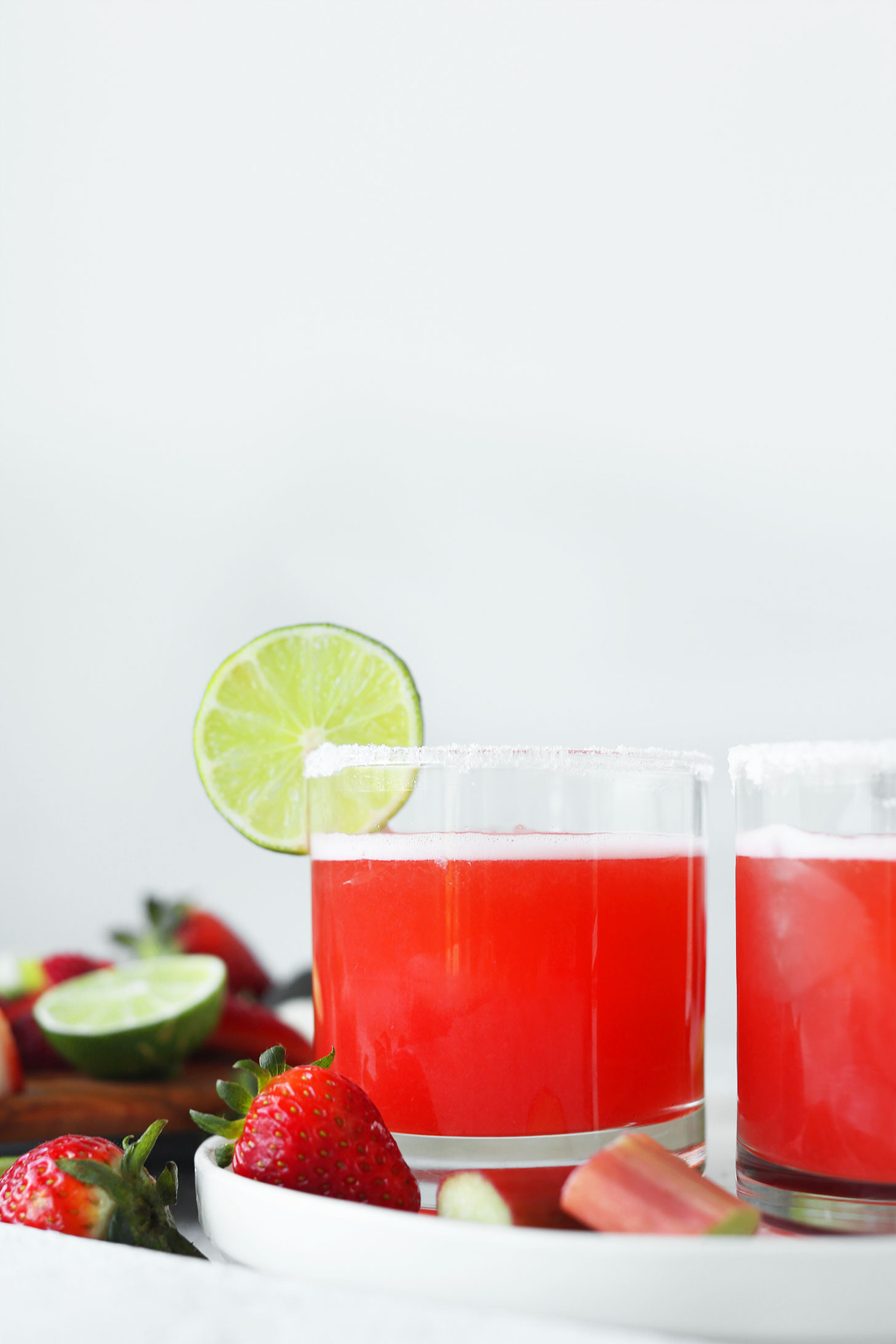 Glasses of our sweet and tart homemade Strawberry Rhubarb Margarita