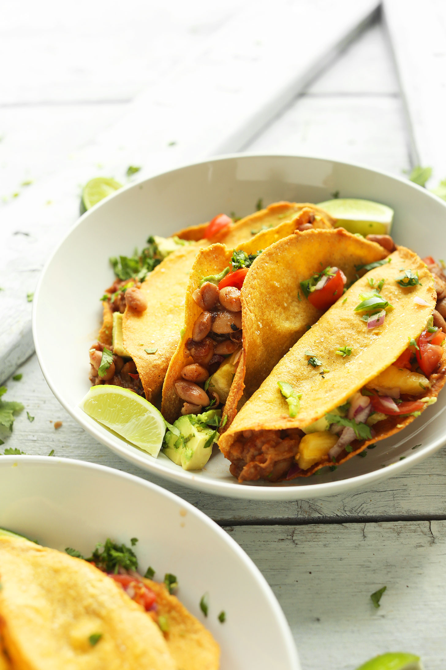 Bowl of our Crispy Baked Tacos with Pineapple Salsa for a delicious plant-based meal