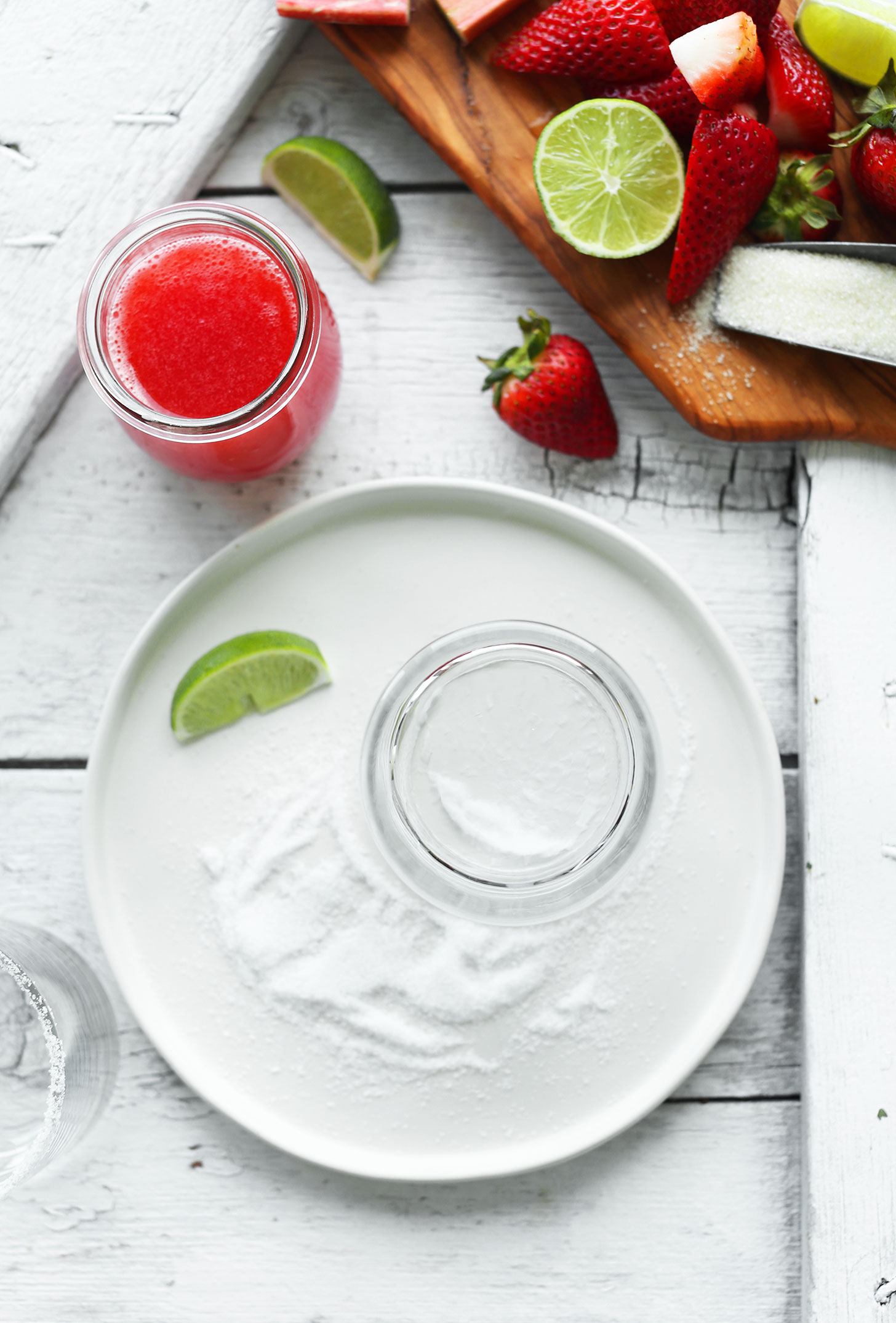 A plate with sugar ready for creating a sugar-lined rim for margaritas