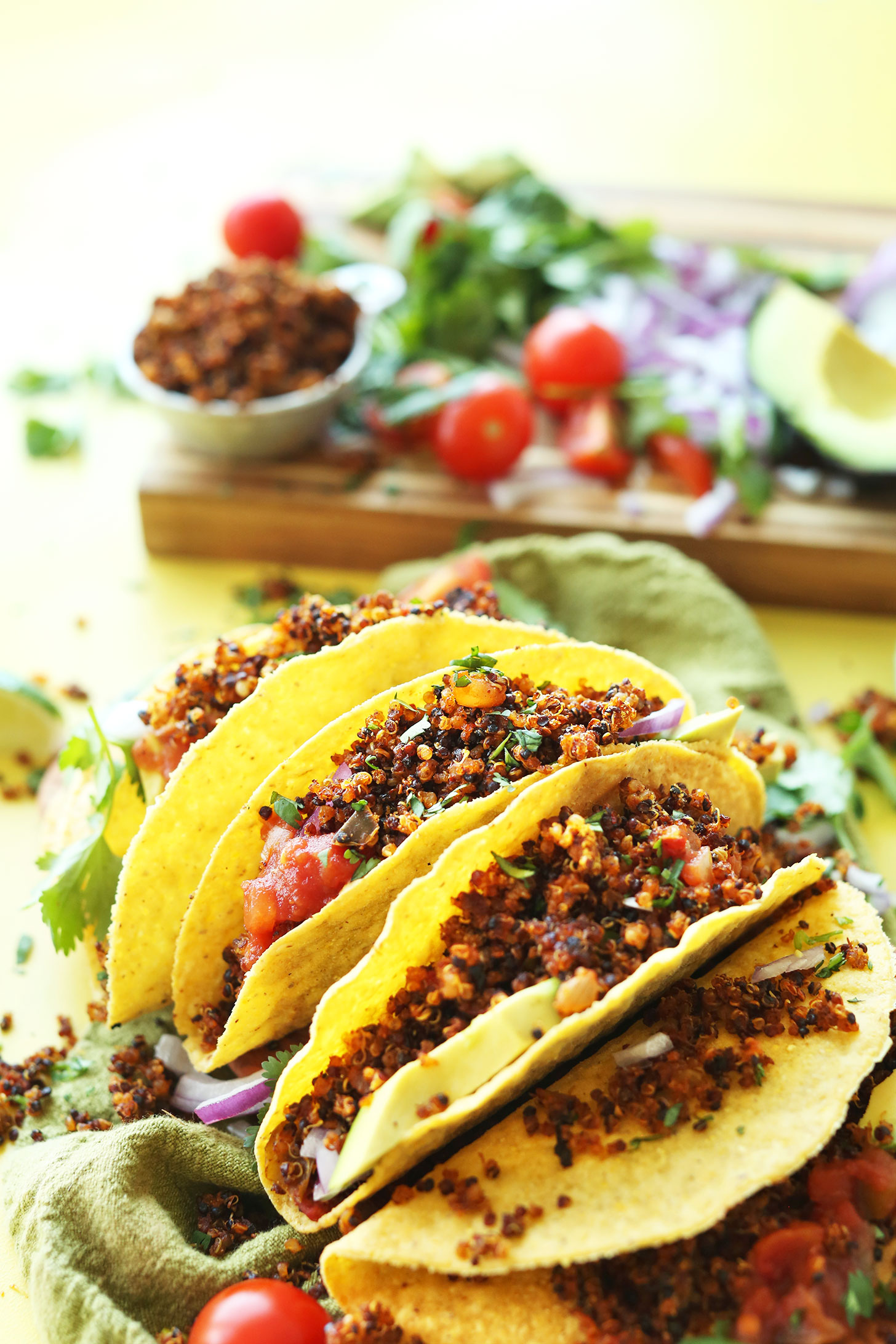 Gluten-free corn tortillas stuffed with our Vegan Quinoa Taco Meat recipe