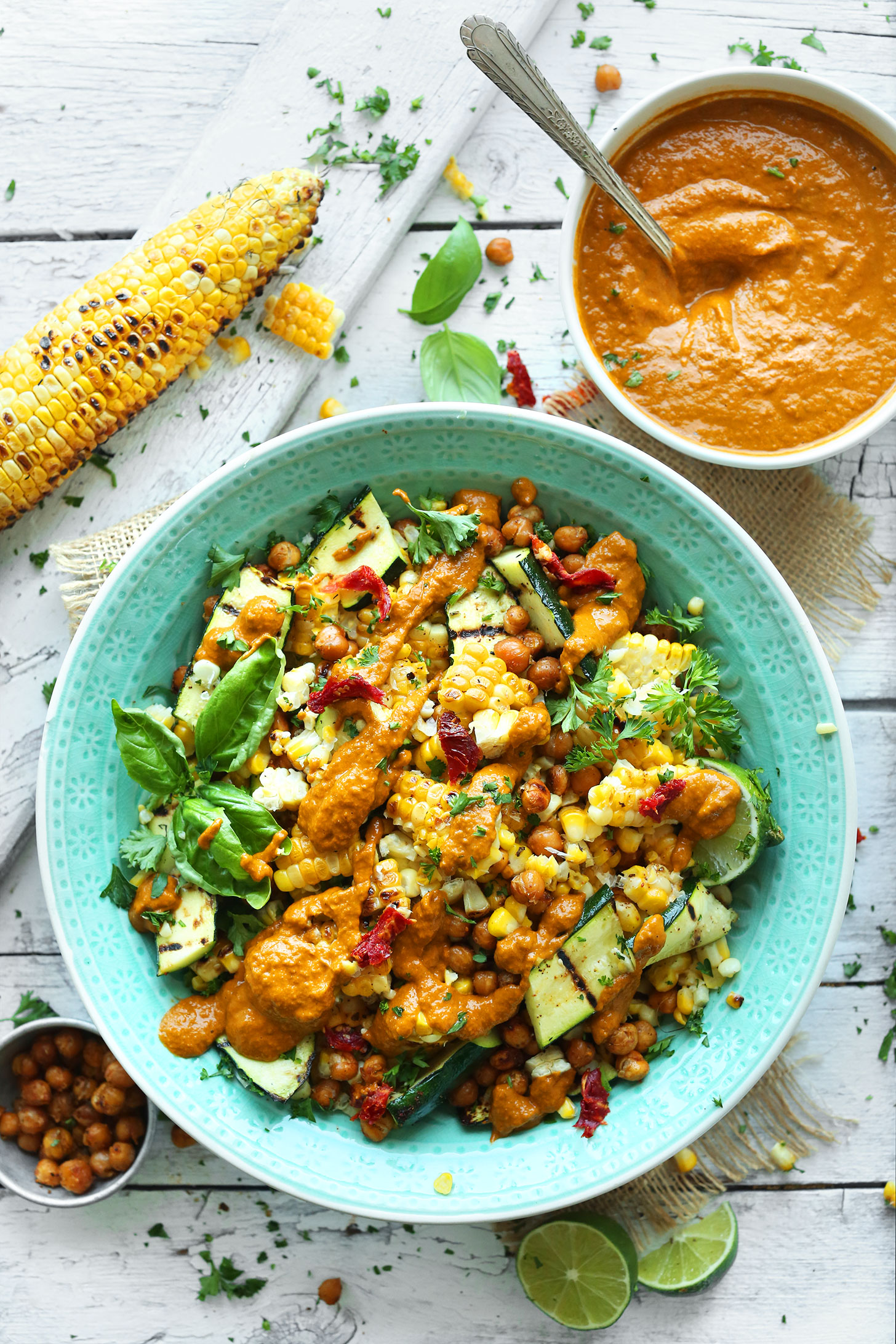 A big bowl of our summery Zucchini and Grilled Corn Salad with Crispy Chickpeas and Sun-Dried Tomato Vinaigrette