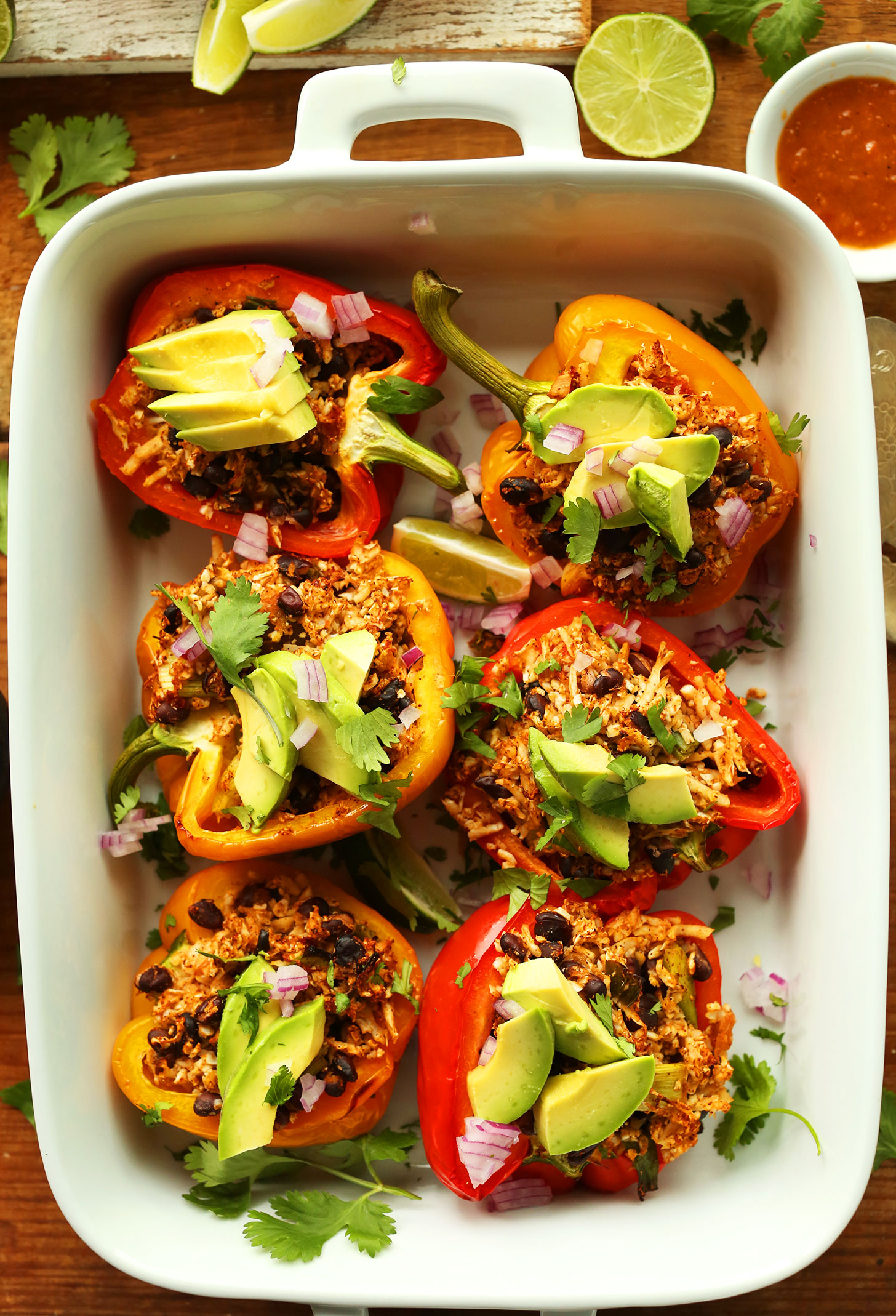 Ceramic baking fish with gluten-free vegan Cauliflower Rice Stuffed Peppers