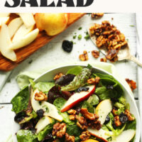 Overhead photo of a bowl of our balsamic pear salad with text above that says 30 minutes and so flavorful