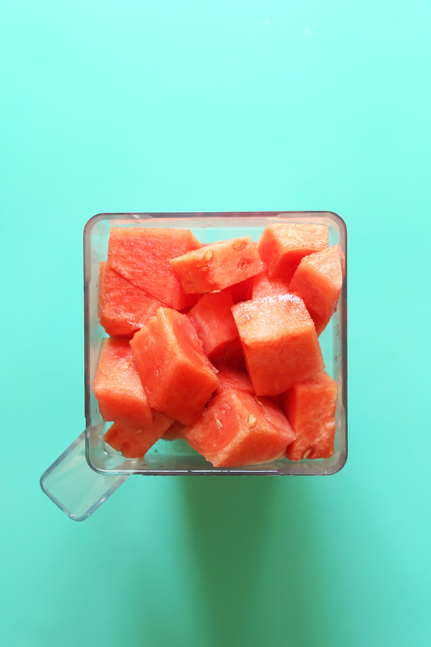 Cubed watermelon in a blender for easy vegan Watermelon margaritas