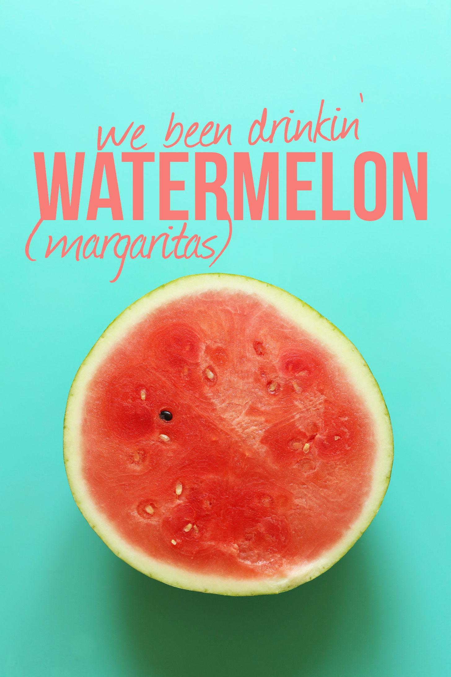 Halved fresh watermelon for vegan watermelon margaritas