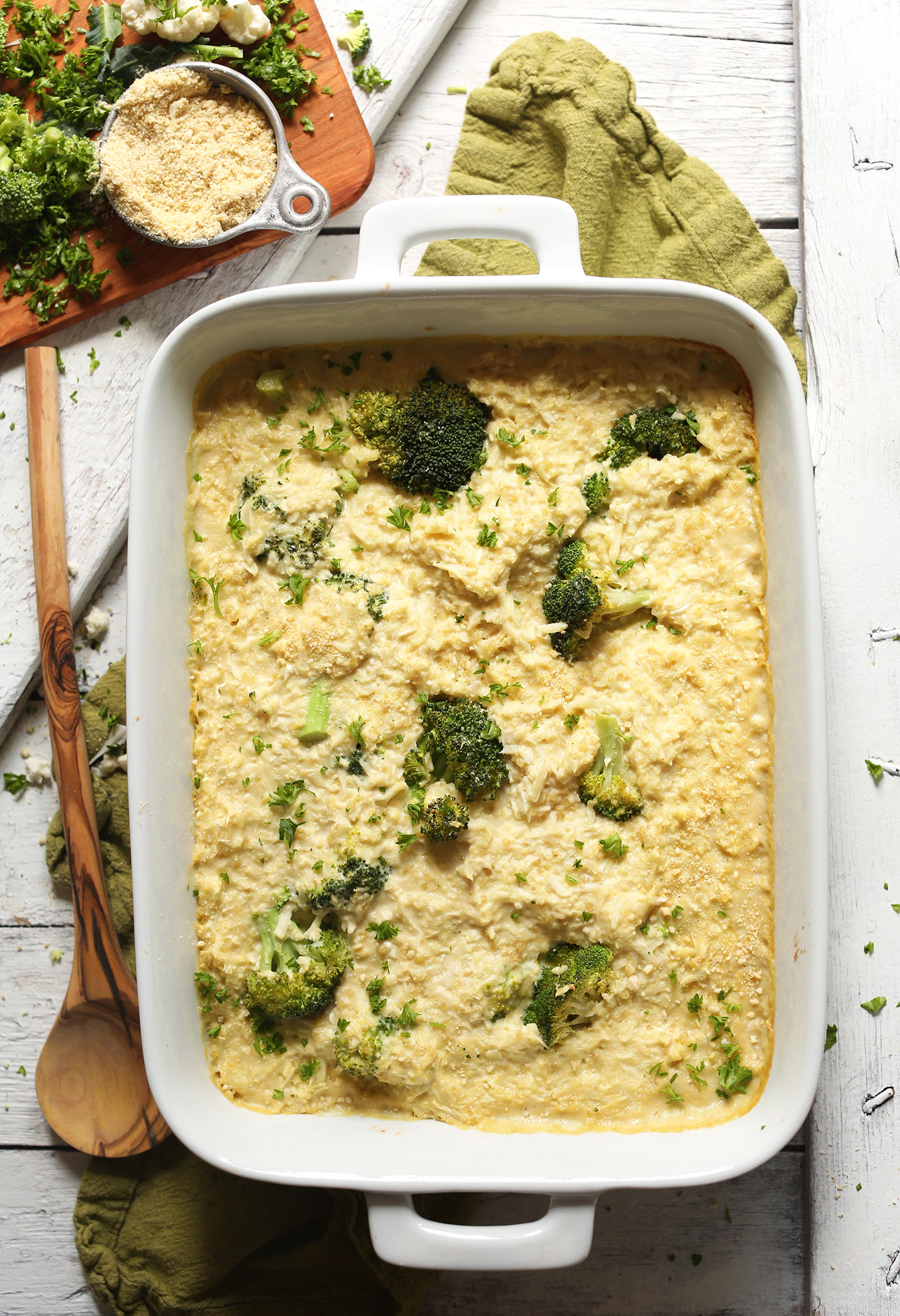 Ceramic baking dish filled with our amazing Cheesy Cauliflower Rice Broccoli Bake