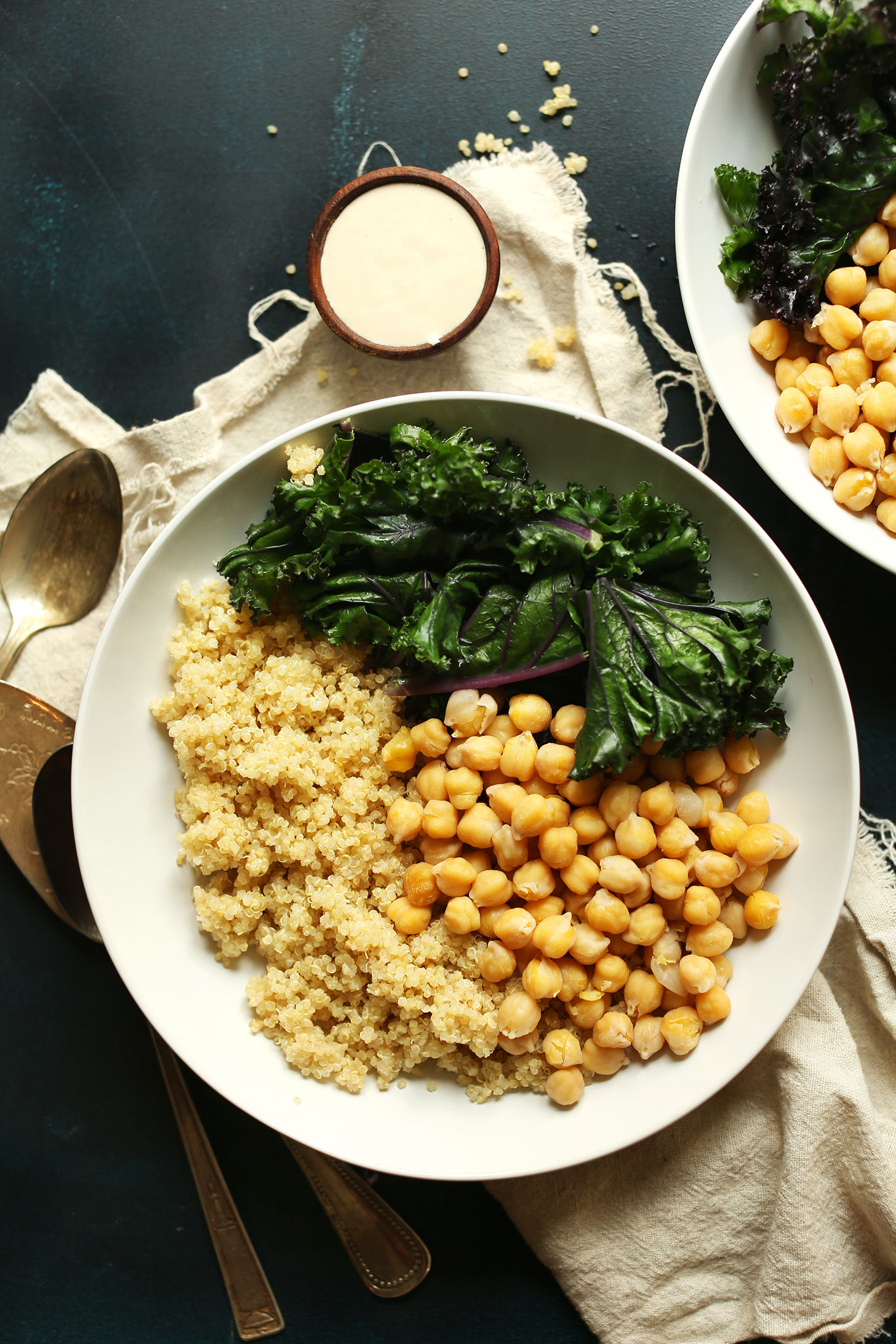 Quinoa Chickpea Buddha Bowls with Kale and Tahini Sauce for a simple plant-based meal