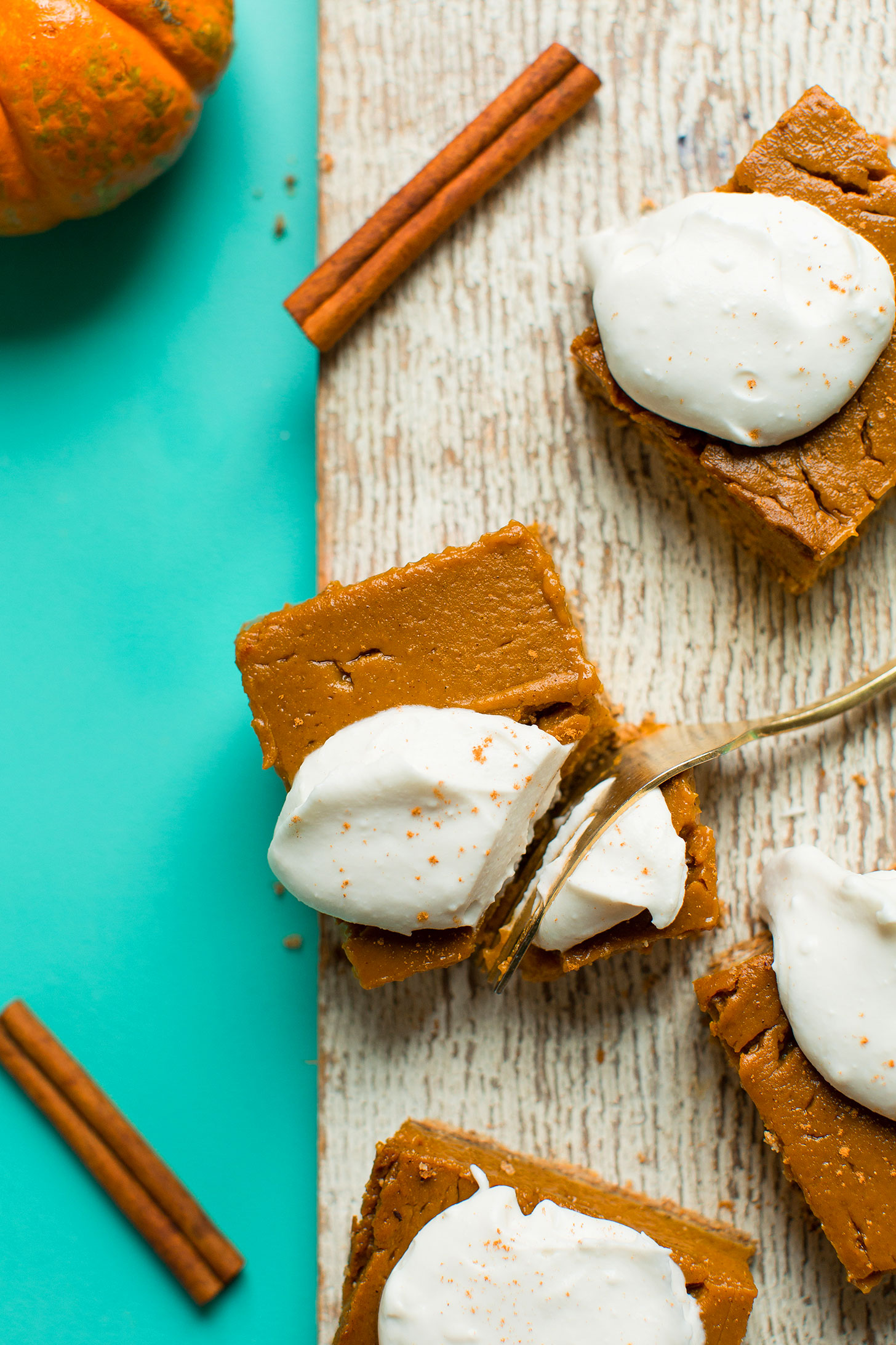 Using a fork to grab a bite of a gluten-free vegan pumpkin pie bar