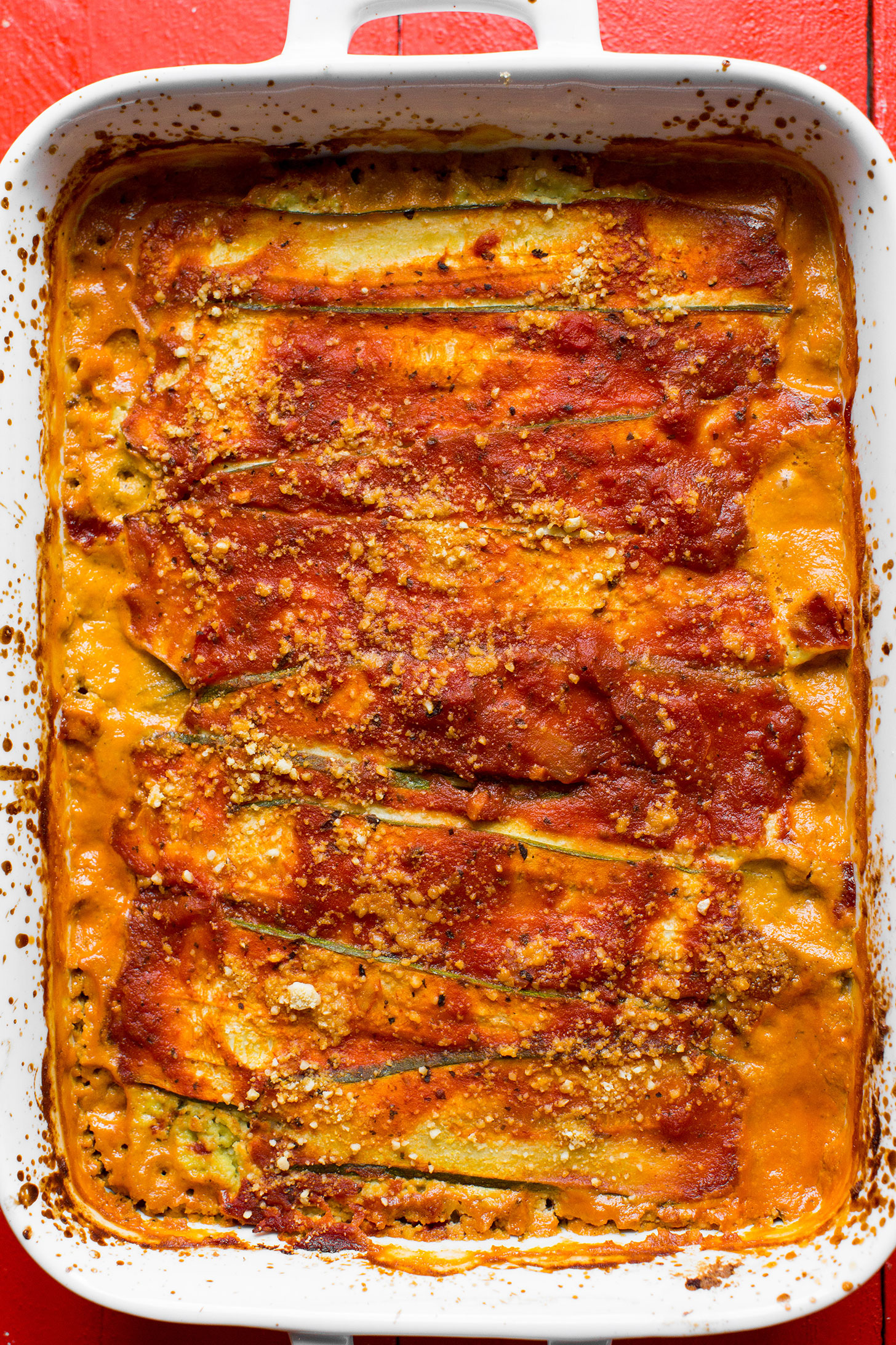 Ceramic baking dish filled with our gluten-free vegan zucchini lasagna