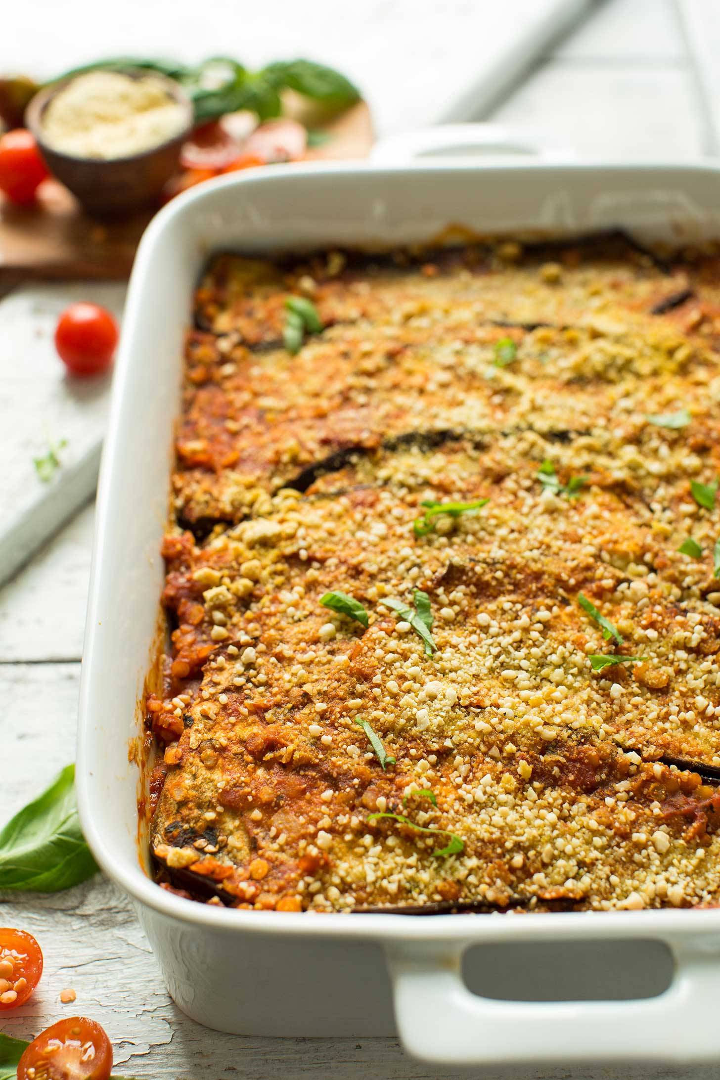 Ceramic baking dish filled with eggplant lasagna for an easy plant-based meal