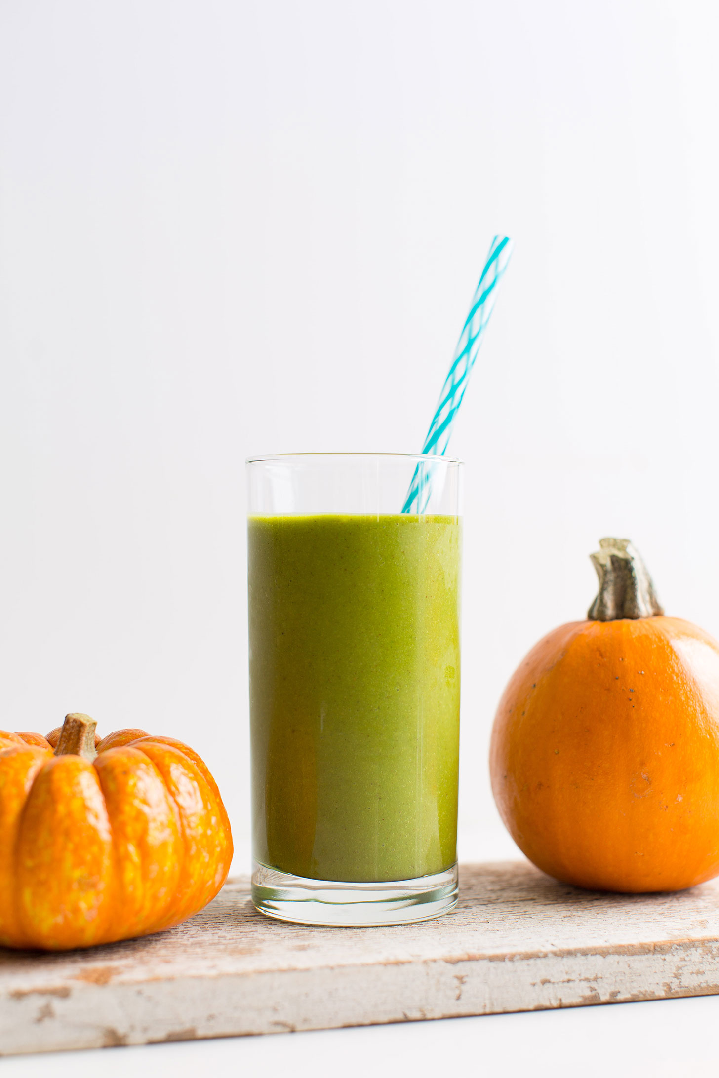 A tall glass of our gluten-free vegan Green Pumpkin Pie Smoothie
