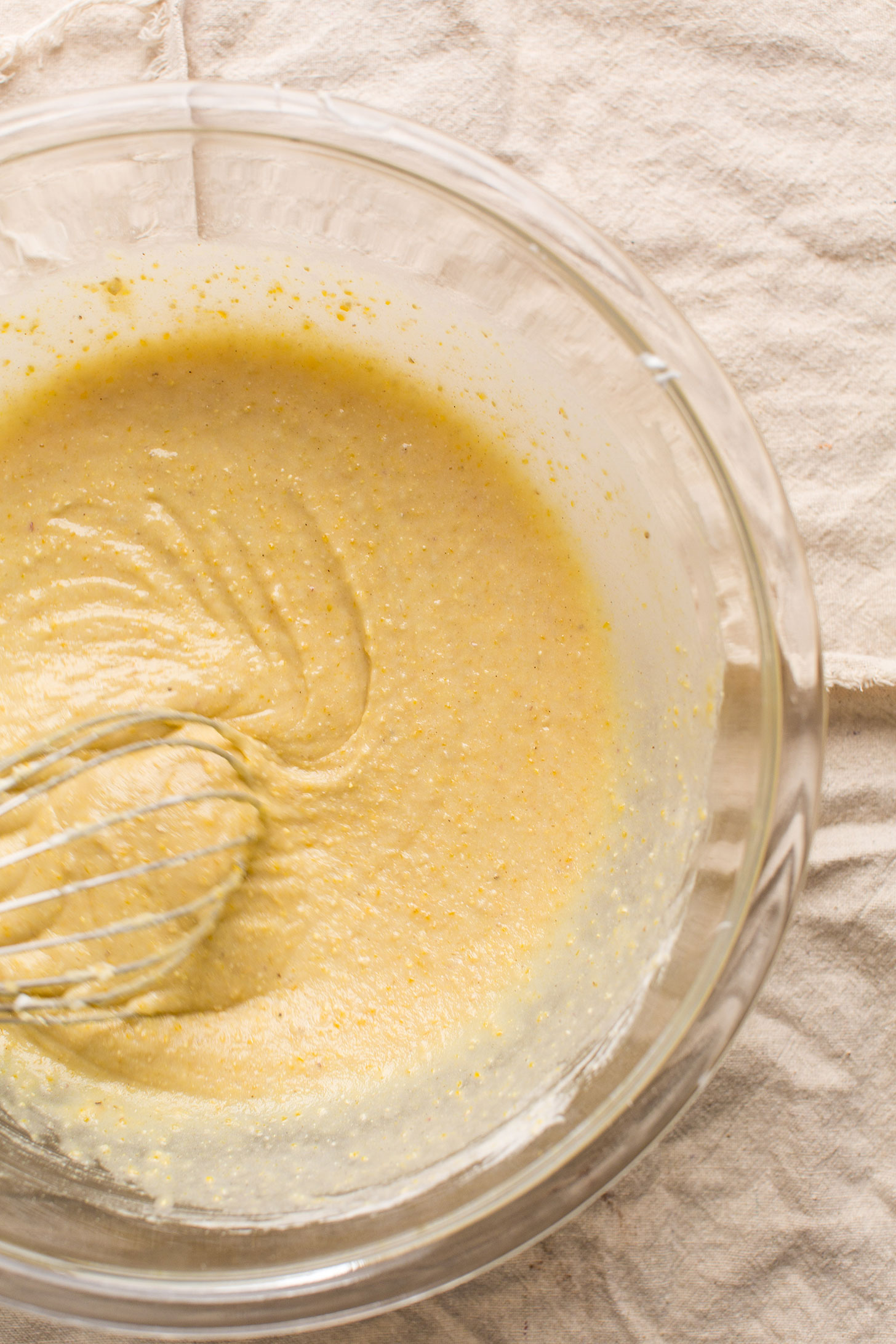 Whisking batter for gluten-free vegan cornbread for an easy fall recipe