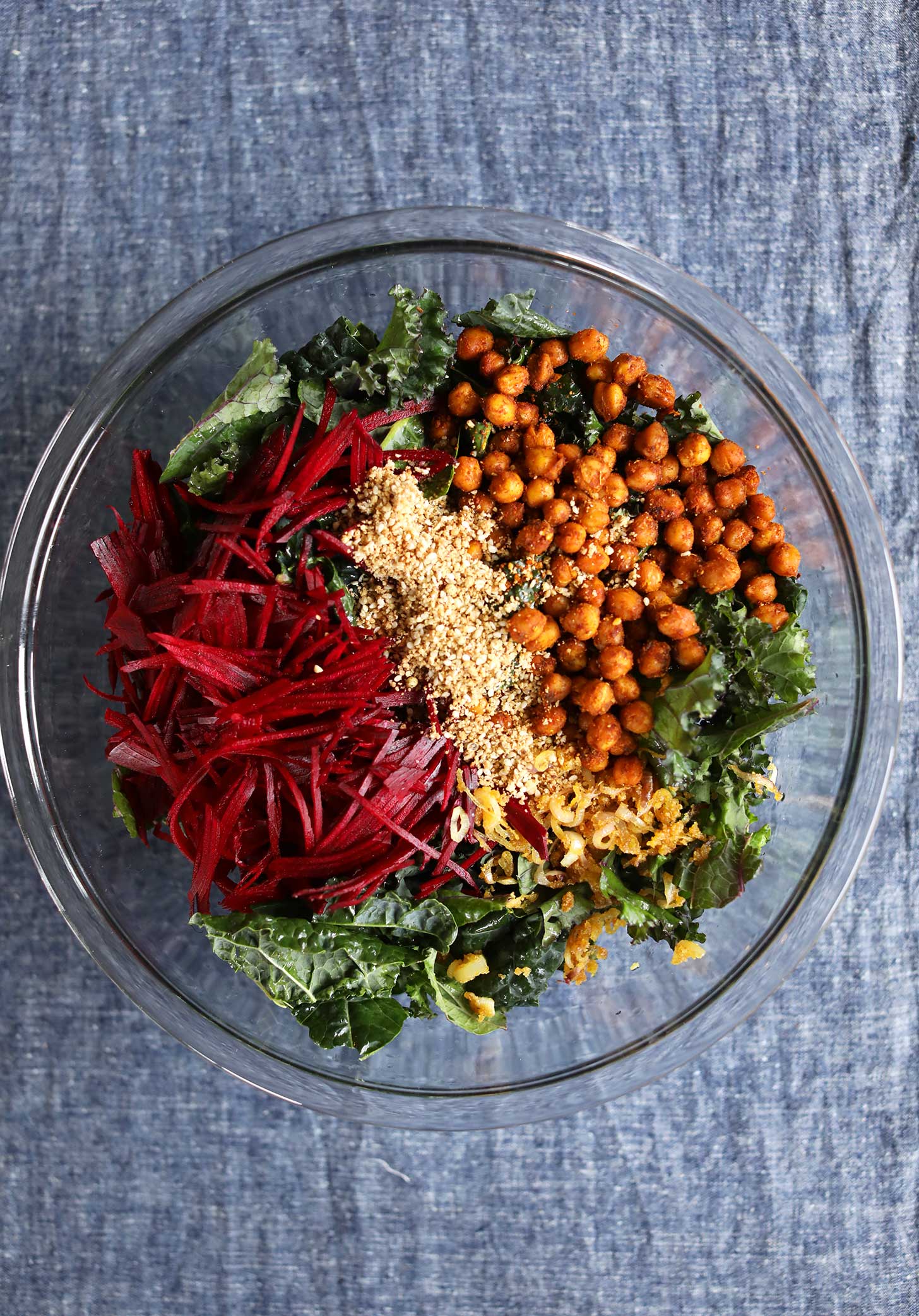 Beautiful bowl of kale, beets, onions, dukkah, and chickpeas