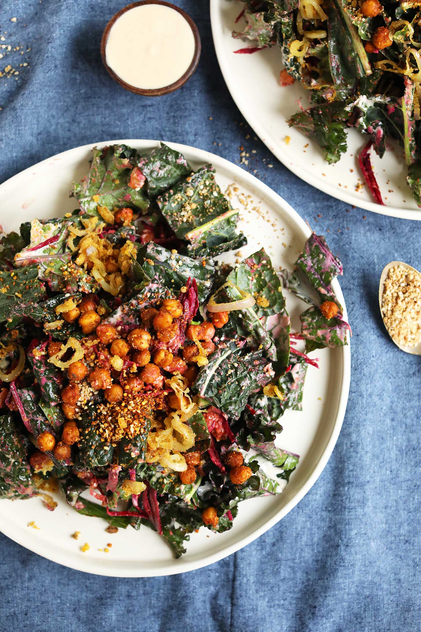 Big salad plate filled with Creamy Chickpea Kale Salad with Smoky Chickpeas ,Beets, and Dukkah