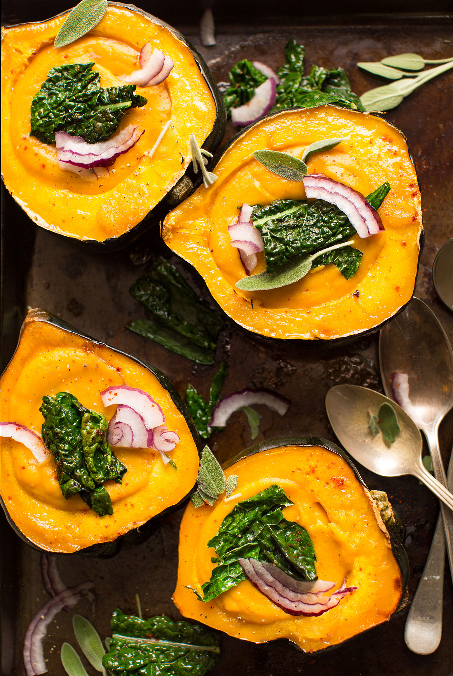 Savory vegan squash soup served in beautiful acorn squash halves