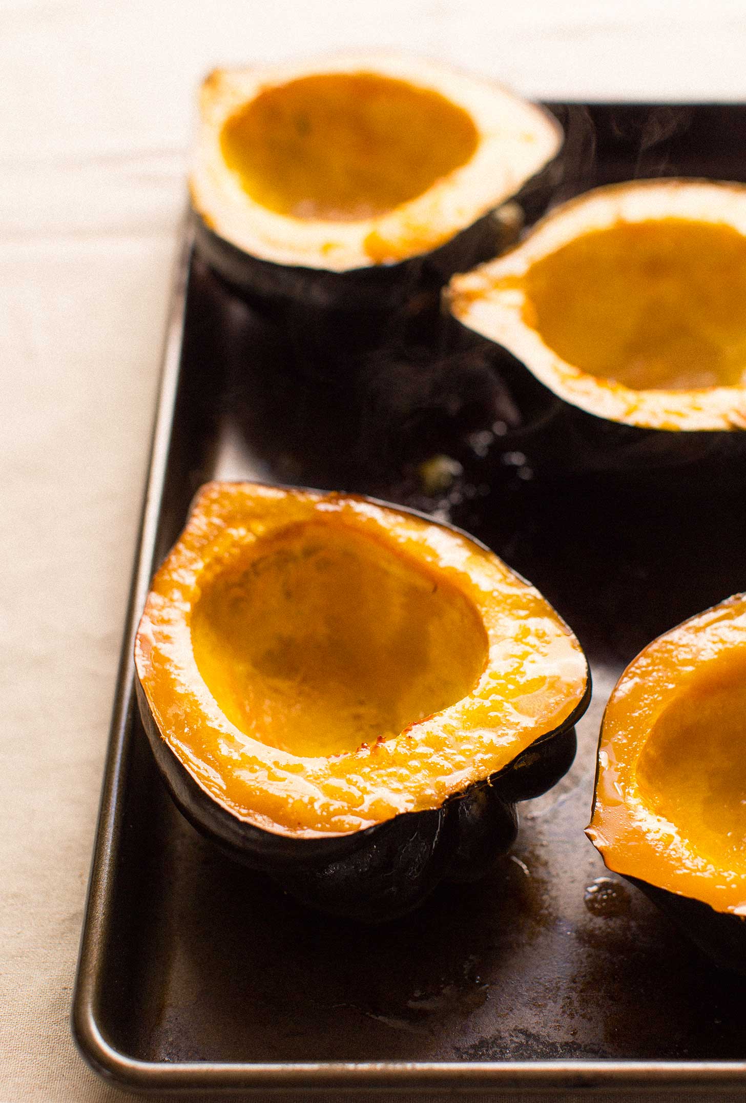 Freshly baked acorn squash halves for serving the Acorn Squash Soup