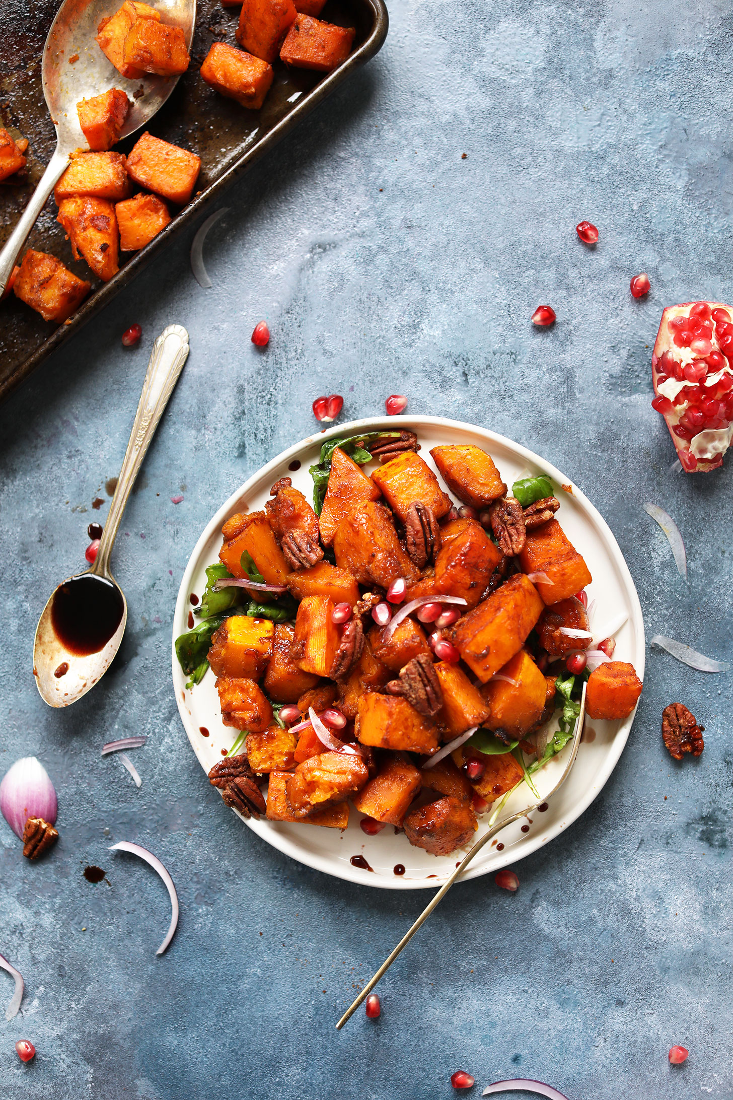 Dinner plate filled with Sweet Spicy Roasted Squash Salad with Cinnamon Sugar Pecans for thanksgiving