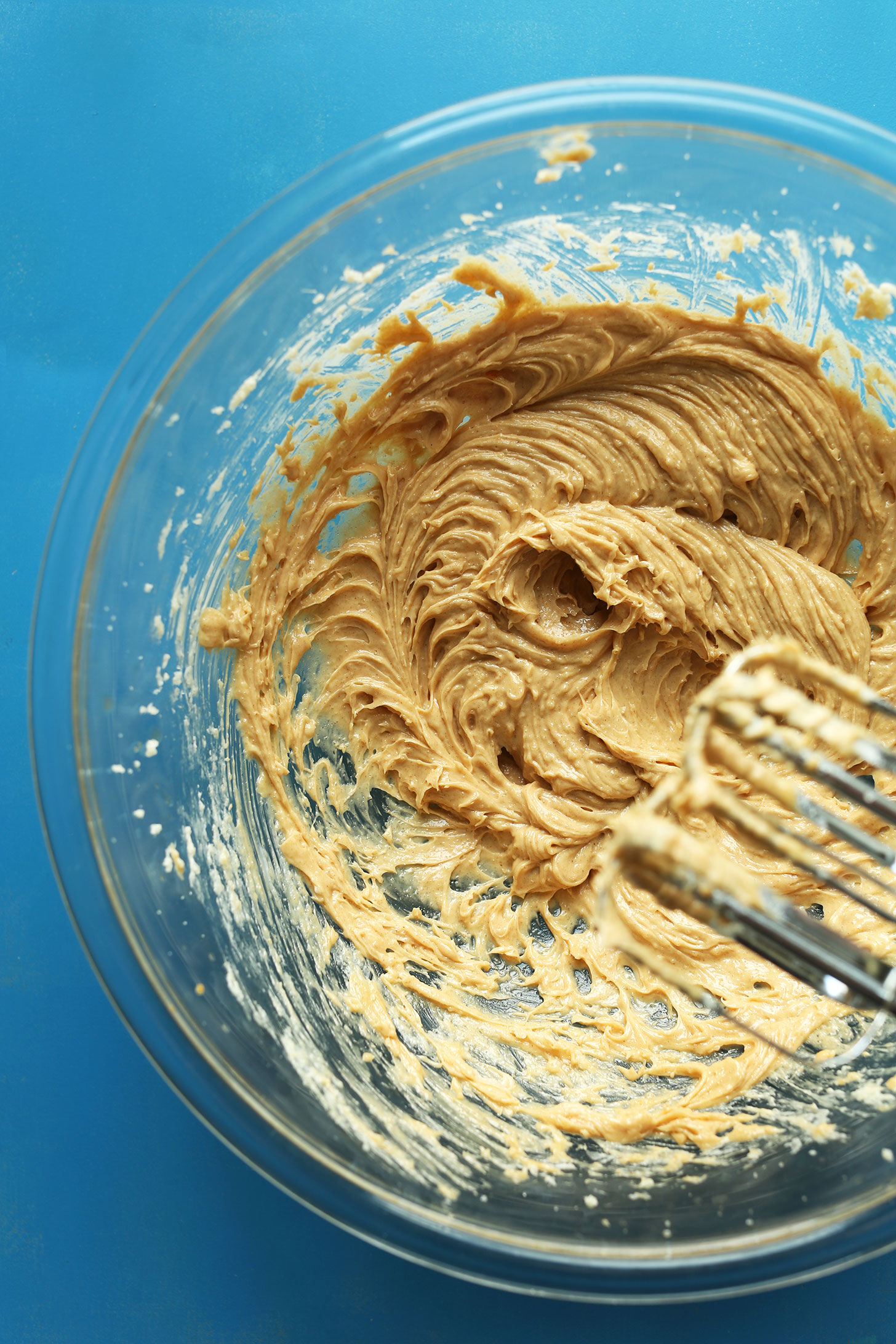Whipping peanut butter for our amazing Peanut Butter Cup Cookies