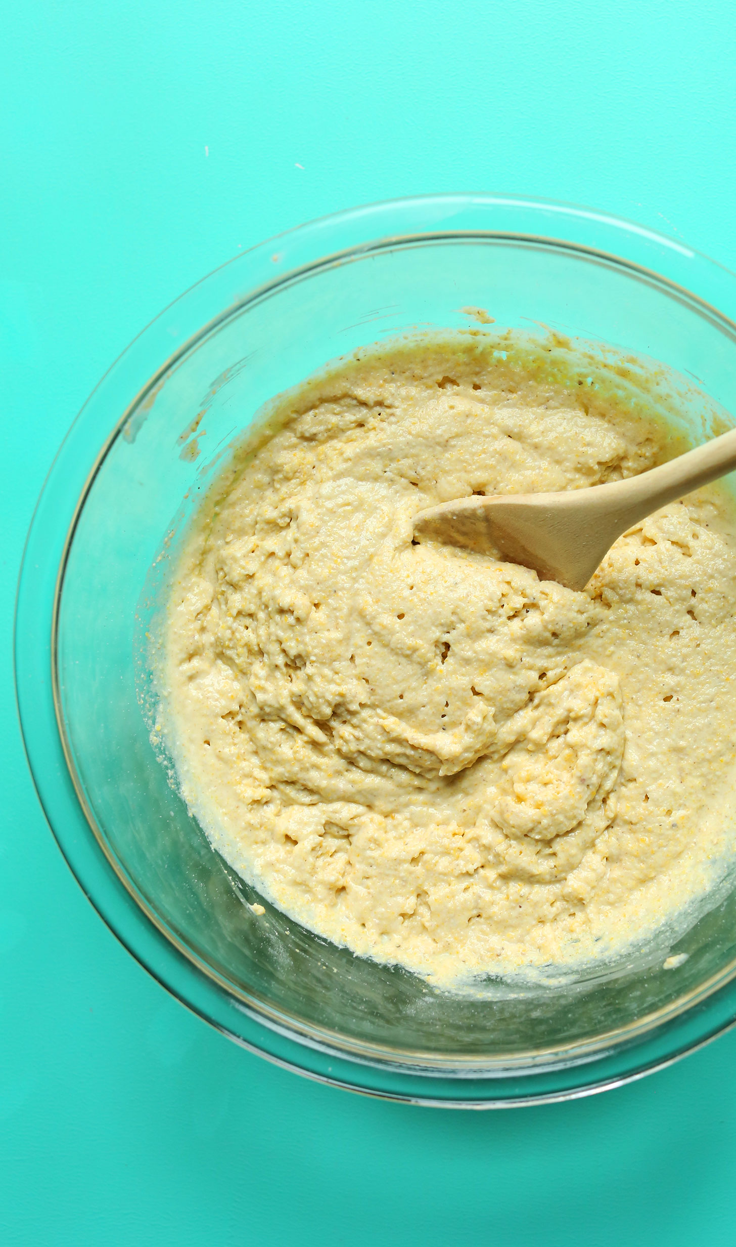 Stirring batter for our gluten-free vegan Cornmeal Pancakes recipe