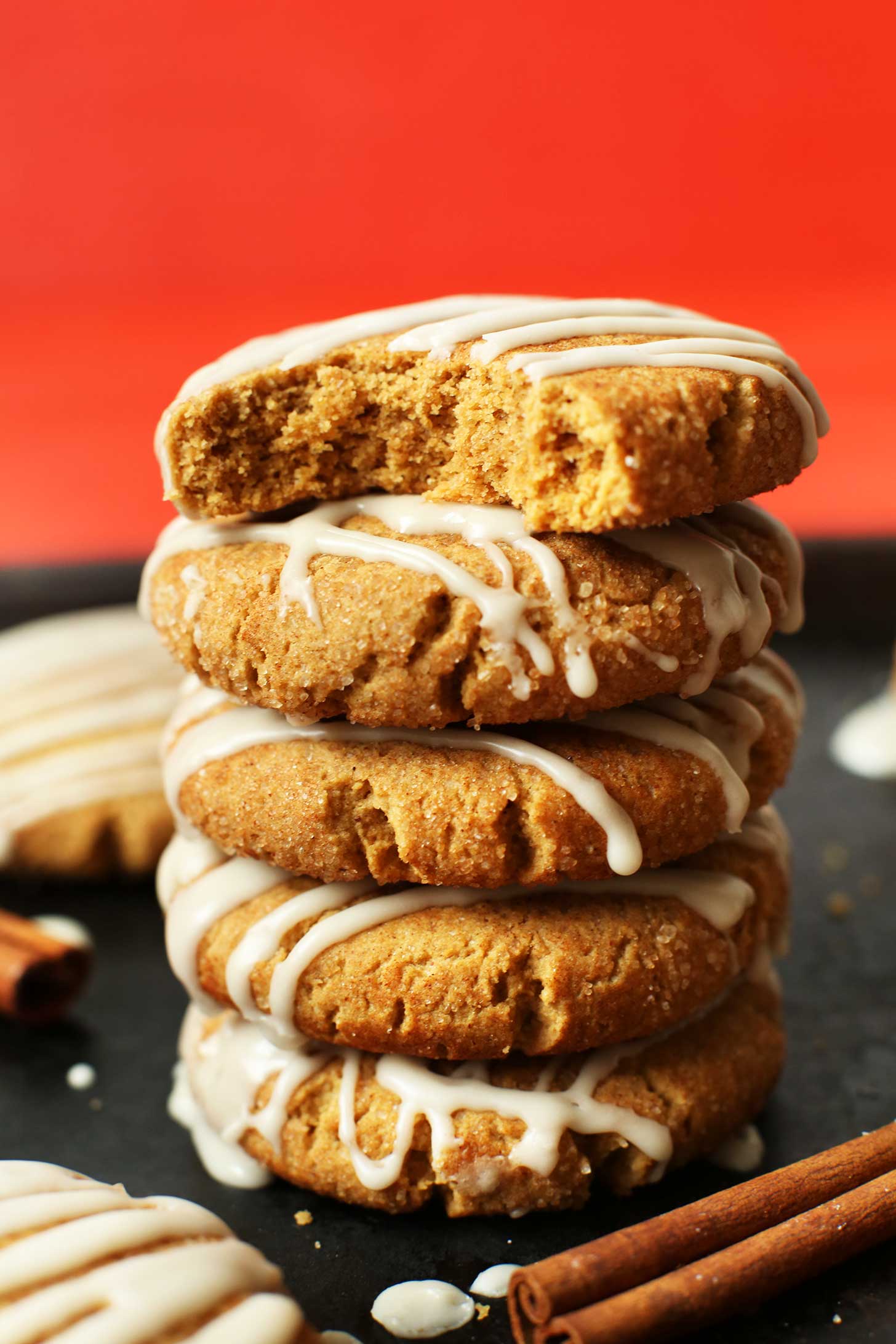 Stack of our gluten-free vegan ginger cookies with icing