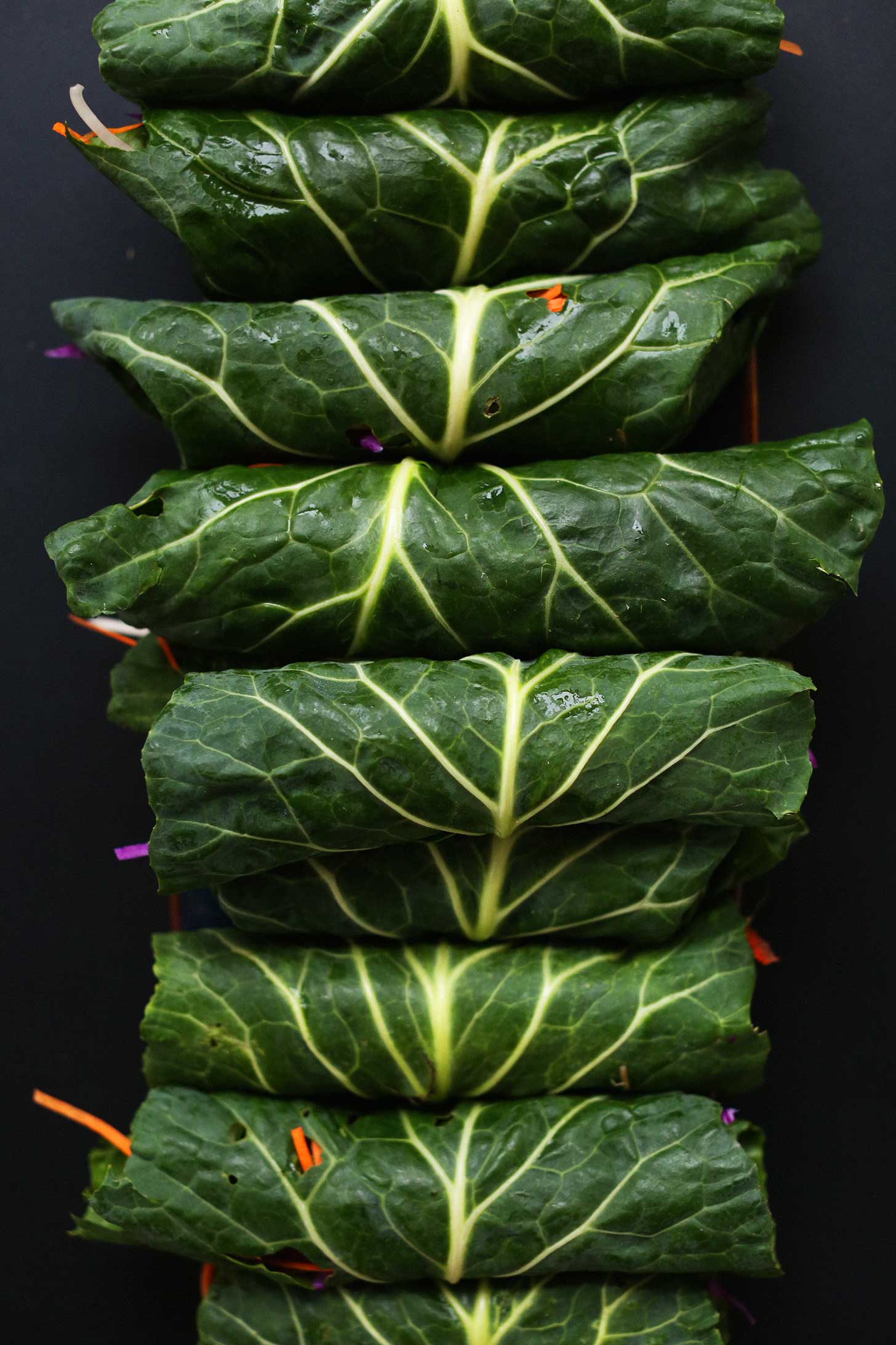 Line of freshly rolled grain-free vegan tofu salad rolls