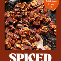 Easy homemade candied spiced nuts on a baking sheet