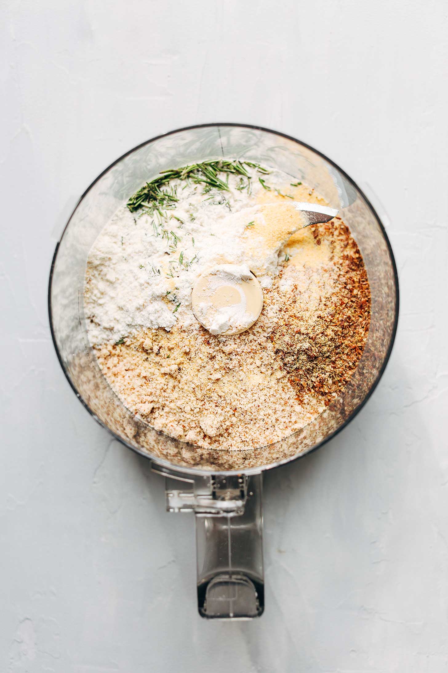 Food processor with ingredients for making easy Vegan Gluten-Free Crackers