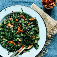 Plate of healthy vegan Collard Greens with Coconut Bacon